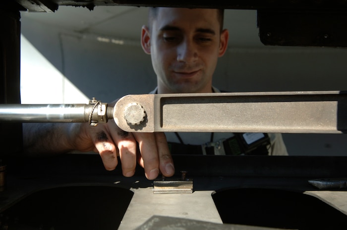 Airman 1st Class Graham Robinson repairs damage to a C-17 engine that occurred in flight en route from Haiti during a humanitarian relief mission Jan. 19. The C-17 will be tasked for another mission to Haiti later this week once the maintenance has been performed. The joint and coalition relief efforts to Haiti have been non-stop since the 7.0-manitude earthquake that occurred Jan. 12. (U.S. Air Force Photo/Airman 1st Class Lauren Main)