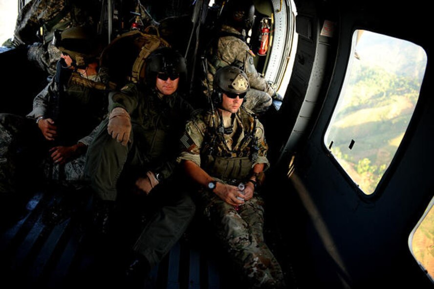 U.S. Air Force Master Sgt. Jason Douville, center, from the 1st Special Operations Support Squadron out of Hurlburt Field, Fla., and Air Force combat controllers fly back to an airport in Port-au-Prince, Haiti, Jan. 17, 2010, after conducting runway and hospital assessments in Jacmel, Haiti. Jacmel is located in southern Haiti and has a city population of 50,000. The city's hospital was destroyed by the earthquake that struck Haiti Jan. 12, 2010, causing medical personnel to treat patients outside the hospital. Approximately 350 people have lost their lives in Jacmel due to the earthquake according to Emmet Murphy, the chief of party for the ACDI/VOCA assistance program for Haiti. (U.S. Air Force photo by Master Sgt. Jeremy Lock/Released)