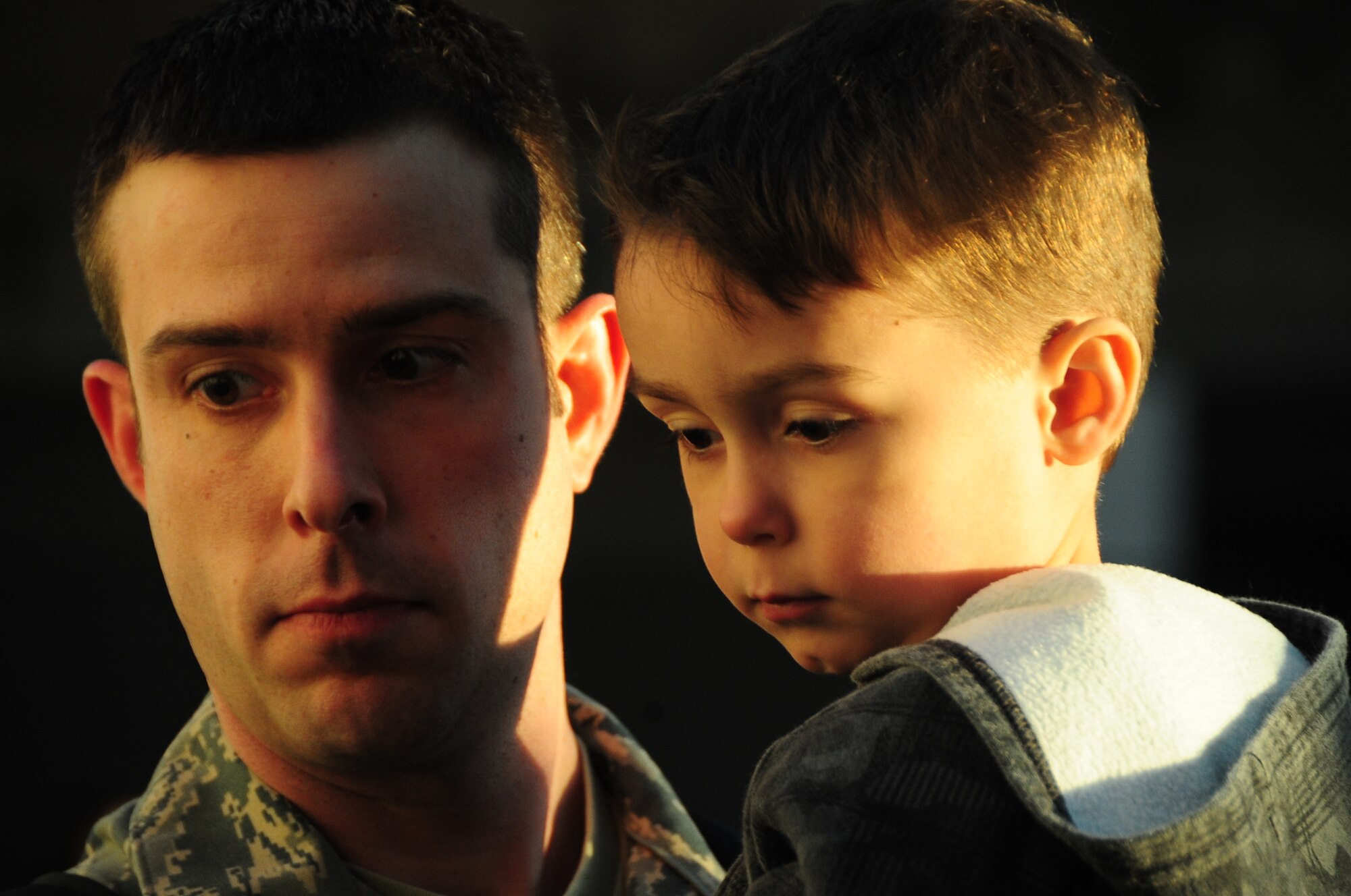 ELLSWORTH AIR FORCE BASE, S.D. -- Tech. Sgt. Jason Haynes, 28th Maintenance Squadron electronic warfare systems craftsman, bids farewell to his son before deploying to Southwest Asia, Jan. 17.  Sergeant Haynes along with more than 300 Airmen will provide support to the 379th Air Expeditionary Wing during their deployment. (U.S. Air Force photo/Airman 1st Class Anthony Sanchelli)