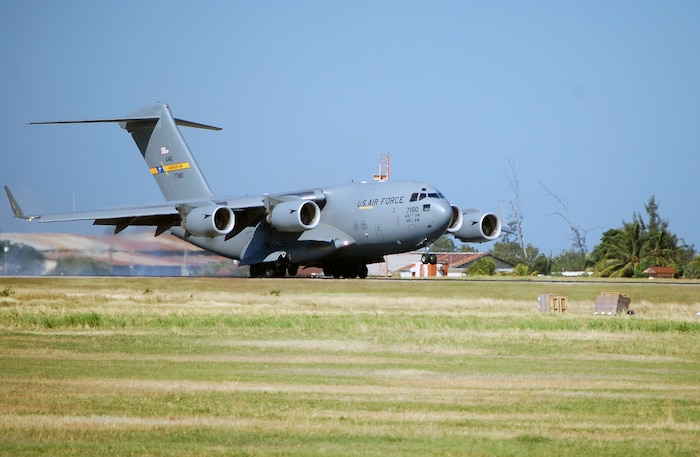 A C-17 Globemaster III from Charleston AFB arrives at Port-au-Prince, Haiti, with relief supplies for U.S. service members and Haitian residents affected by the Jan. 12 7.0-magnitude earthquake Jan. 18, 2010.  Charleston AFB is the Air Force?s air operations hub for all C-17 relief effort flights. (U.S. Air Force photo/Master Sgt. Sean P. Houlihan)