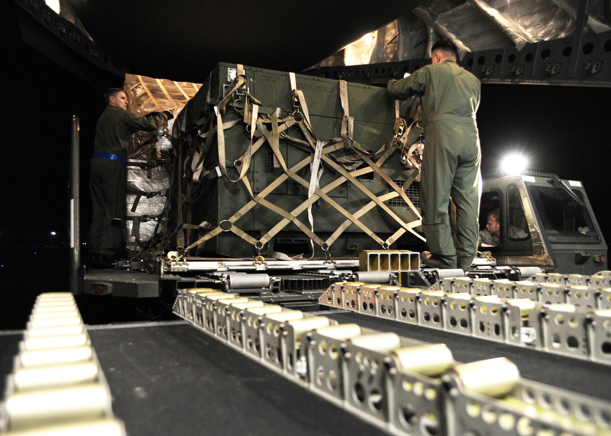 Equipment is loaded onto a C-17 Globemaster III at Joint Base McGuire-Dix-Lakehurst, N.J. Jan. 15, 2010, to be transported to Haiti. (U.S. Air Force photo/Senior Airman Katie Gieratz)