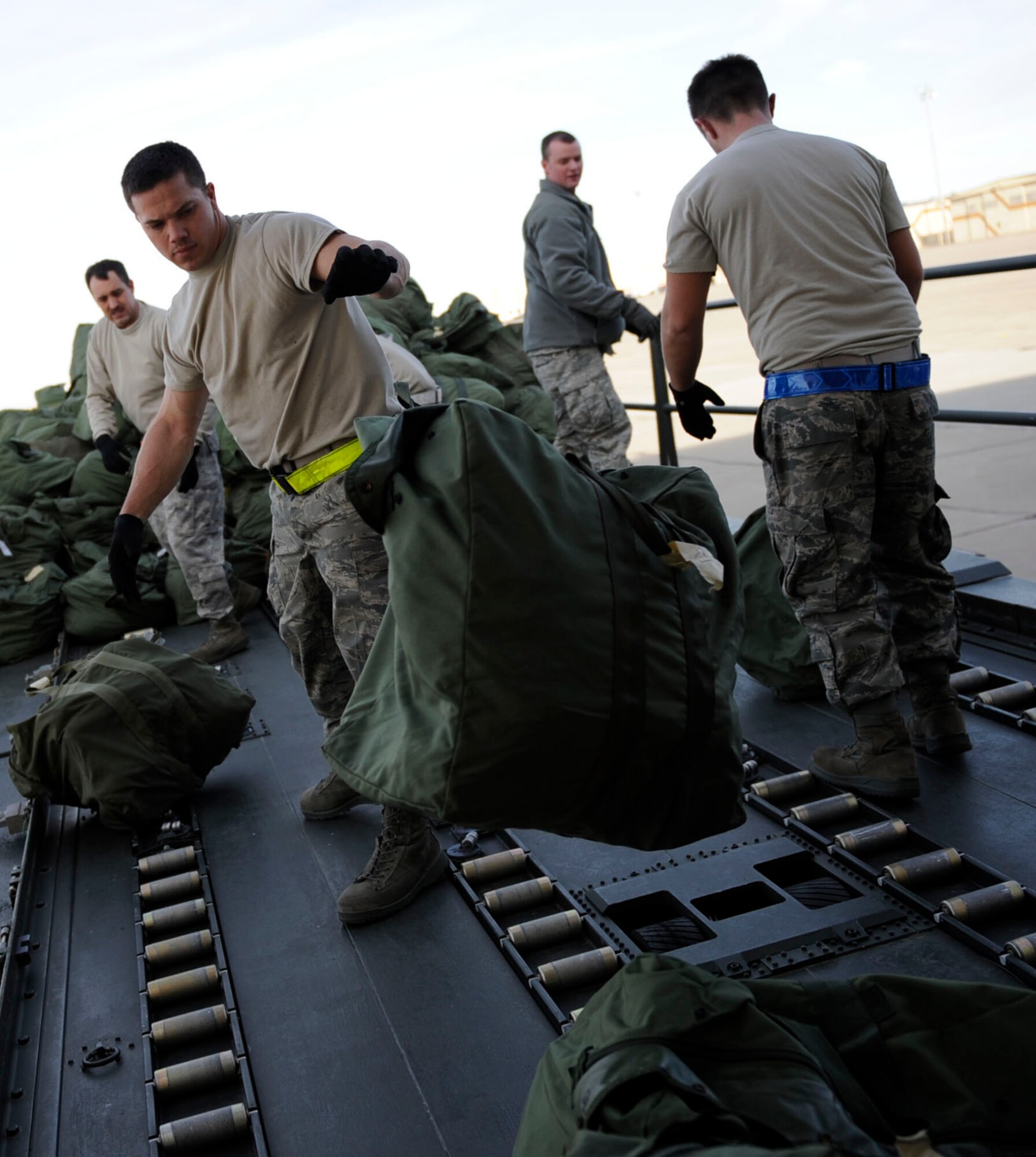 MOUNTAIN HOME AIR FORCE BASE, Idaho – Airmen from the 726th Air Control Squadron help load mobility bags before the 391st Fighter Squadron deploys to the Republic of Korea Jan. 18. The 391st FS “Bold Tigers” will deploy more than 300 of their Airmen to Republic of Korea to continue the combat capability provided by the 389th Fighter Squadron. The deployed Gunfighters will work alongside ROK-U.S. alliance partners to maintain peace and stability in the region. (U.S. Air Force photo by Airman 1st Class Renishia Richardson)