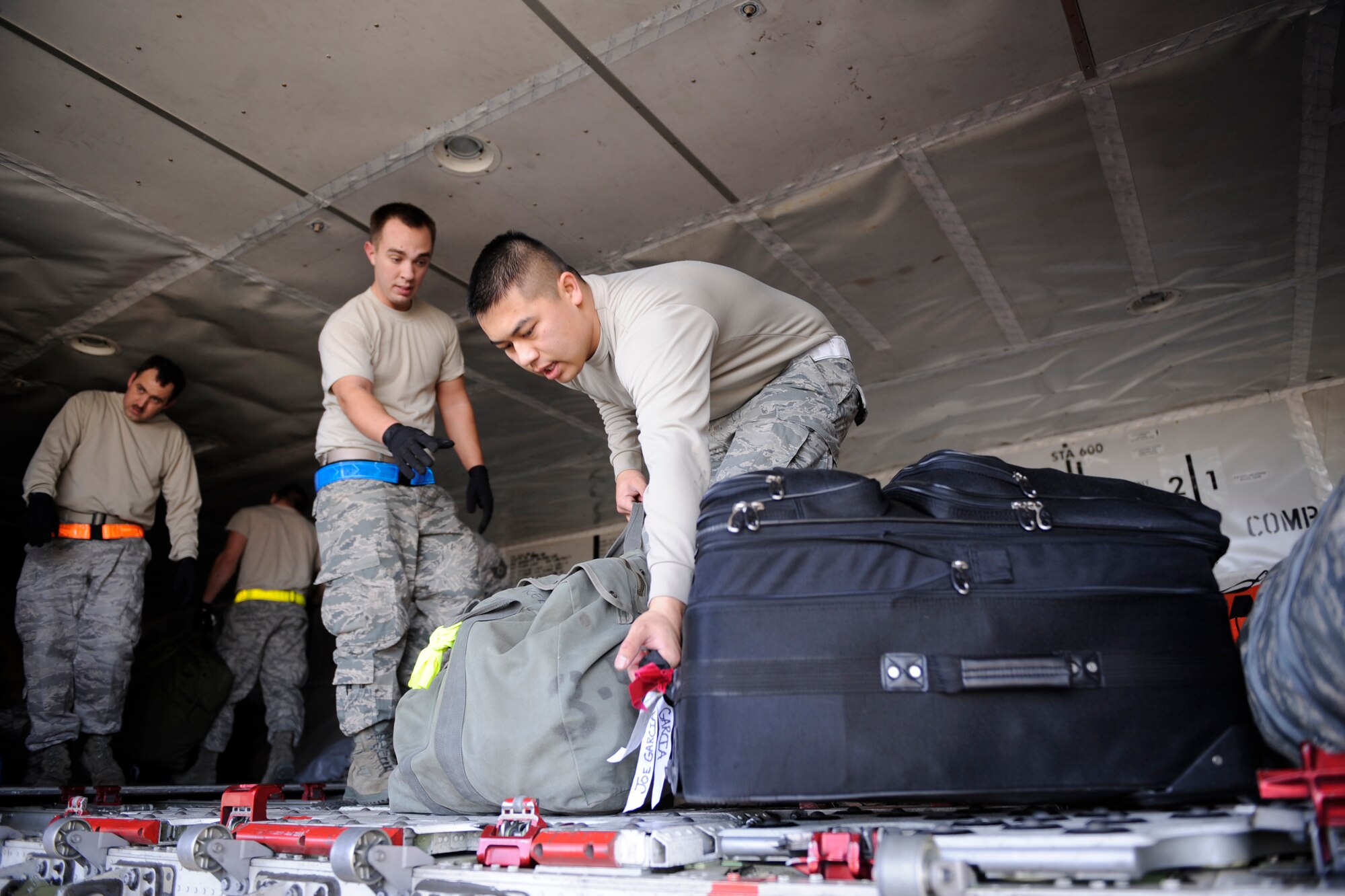 MOUNTAIN HOME AIR FORCE BASE, Idaho – Airmen from the 726th Air Control Squadron help load mobility bags before the 391st Fighter Squadron deploys to the Republic of Korea Jan. 18. The 391st FS “Bold Tigers” will deploy more than 300 of their Airmen to Republic of Korea to continue the combat capability provided by the 389th Fighter Squadron. The deployed Gunfighters will work alongside ROK-U.S. alliance partners to maintain peace and stability in the region. (U.S. Air Force photo by Airman 1st Class Renishia Richardson)