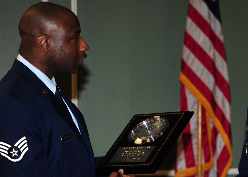 SHAW AIR FORCE BASE, S.C. -- Staff Sgt. Tyrone Thompson, president of the Shaw black heritage committee, prepares to present a token of appreciation during the Martin Luther King, Jr. luncheon Jan. 15, 2010. (U.S. Air Force Photo/2nd Lt. Tony Richardson)