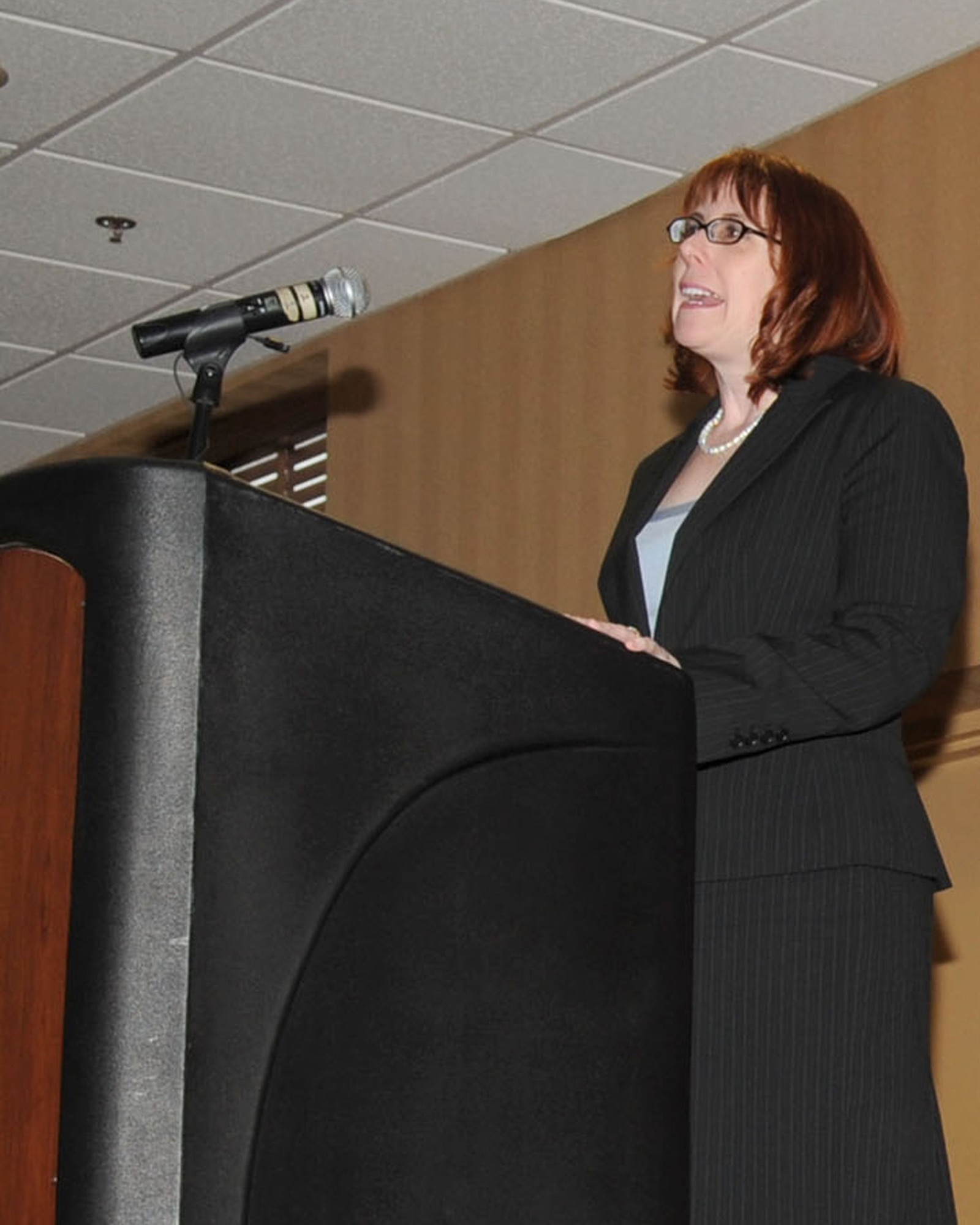 Guest speaker Cathleen Dooley, Assistant District Attorney for the Civil Rights division of the Arizona Attorney General's office, addresses attendees of the Martin Luther King Jr. breakfast event at the Mirage Officers' Club here Jan. 14. Hosted by the 355th Fighter Wing, this annual event serves as a opportunity to increase awareness and educate people on Dr. King's life and contributions to the civil rights movement. (U.S. Air Force photo/Airman Jerilyn Quintanilla)
