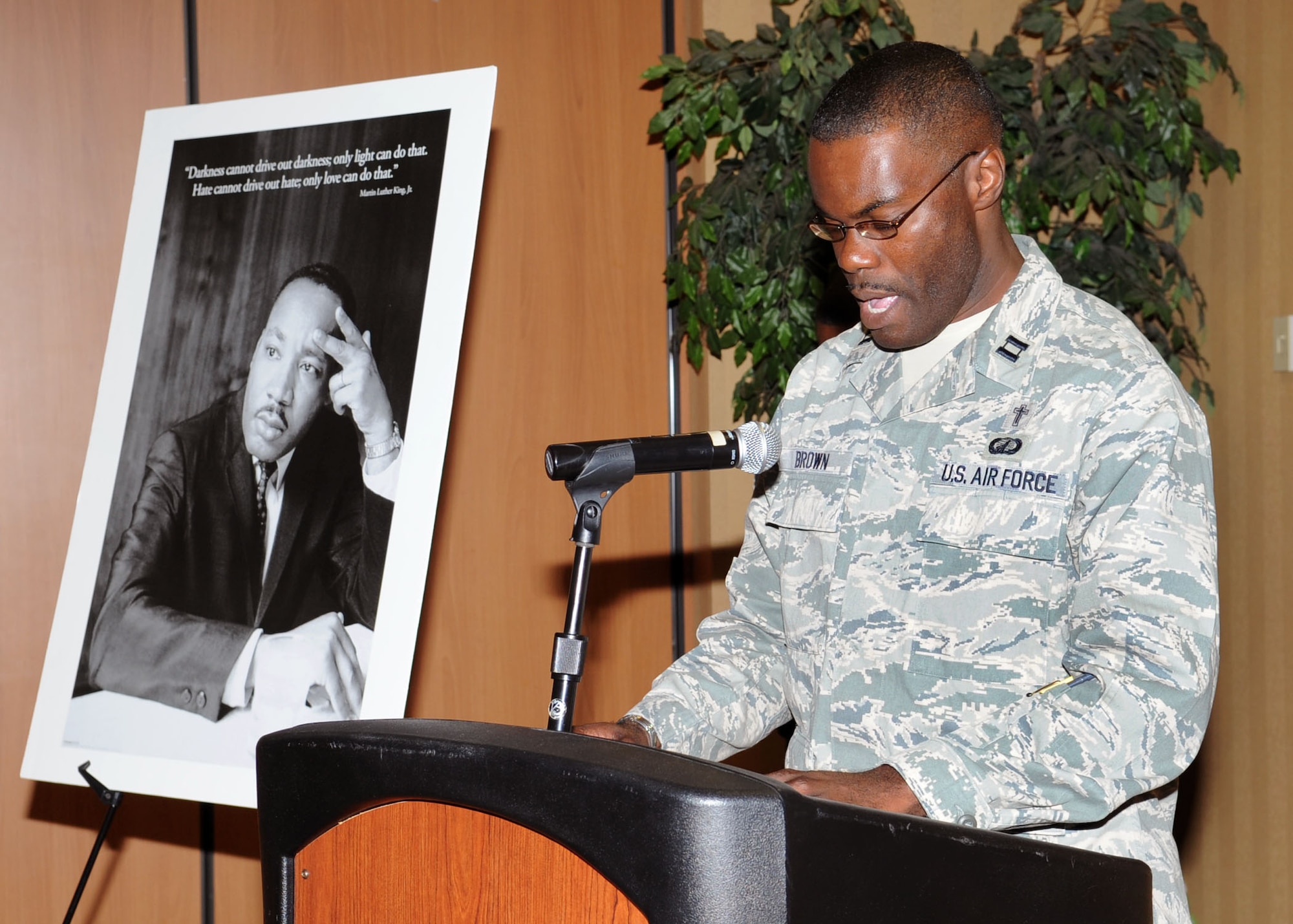 Capt. Aleck Brown, 355th Fighter Wing chaplain, gives the benediction at the Martin Luther King Jr. breakfast event at the Mirage Officers' Club here Jan. 14. Hosted by the 355th Fighter Wing, this annual event serves as an opportunity to increase awareness and educate people on Dr. King's life and contributions to the civil rights movement. (U.S. Air Force photo/Airman Jerilyn Quintanilla)
