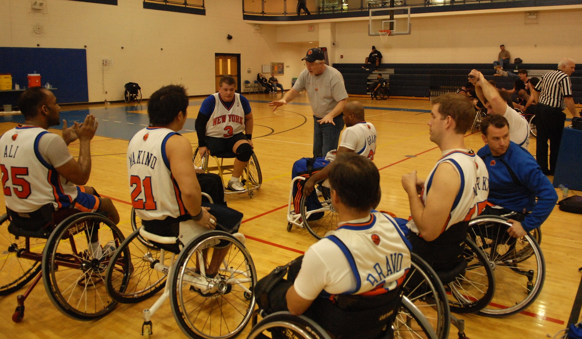 LANGLEY AIR FORCE BASE, Va. -- New York Rollin' Knicks Coach Jerry Fleming speaks to his team at halftime in a game against the Charlottesville Cardinals Jan. 17. The Rollin' Knicks won the game in overtime 68-65. (U.S. Air Force photo/Airman 1st Class Jason J. Brown)