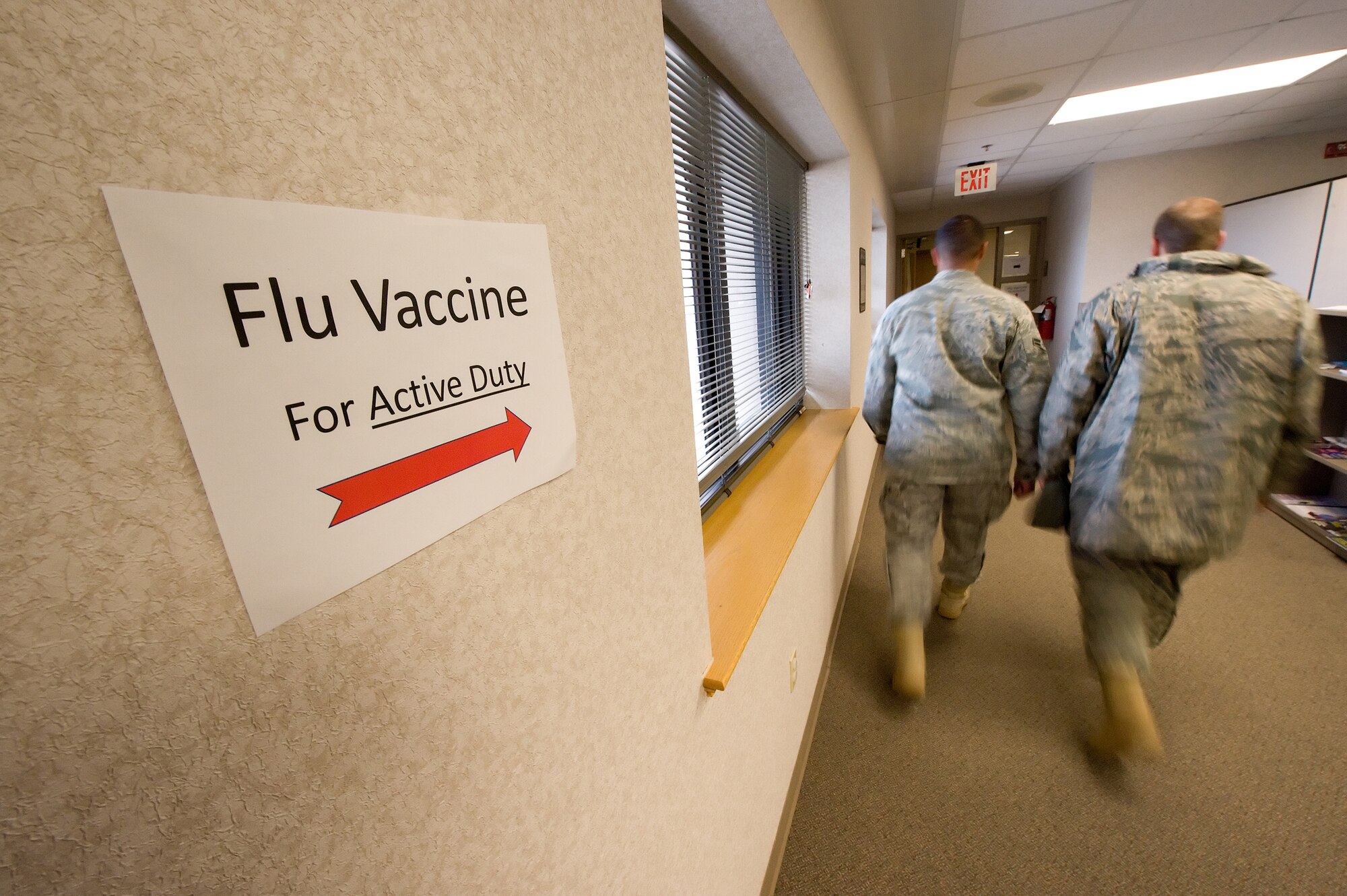 Team Dover Airmen arrive at the 436th Medical Group to receive their H1N1 influenza vaccines Jan. 16. The vaccine is to prevent the spread of the H1N1 strain of the influenza virus. (U.S. Air Force photo/Jason Minto)