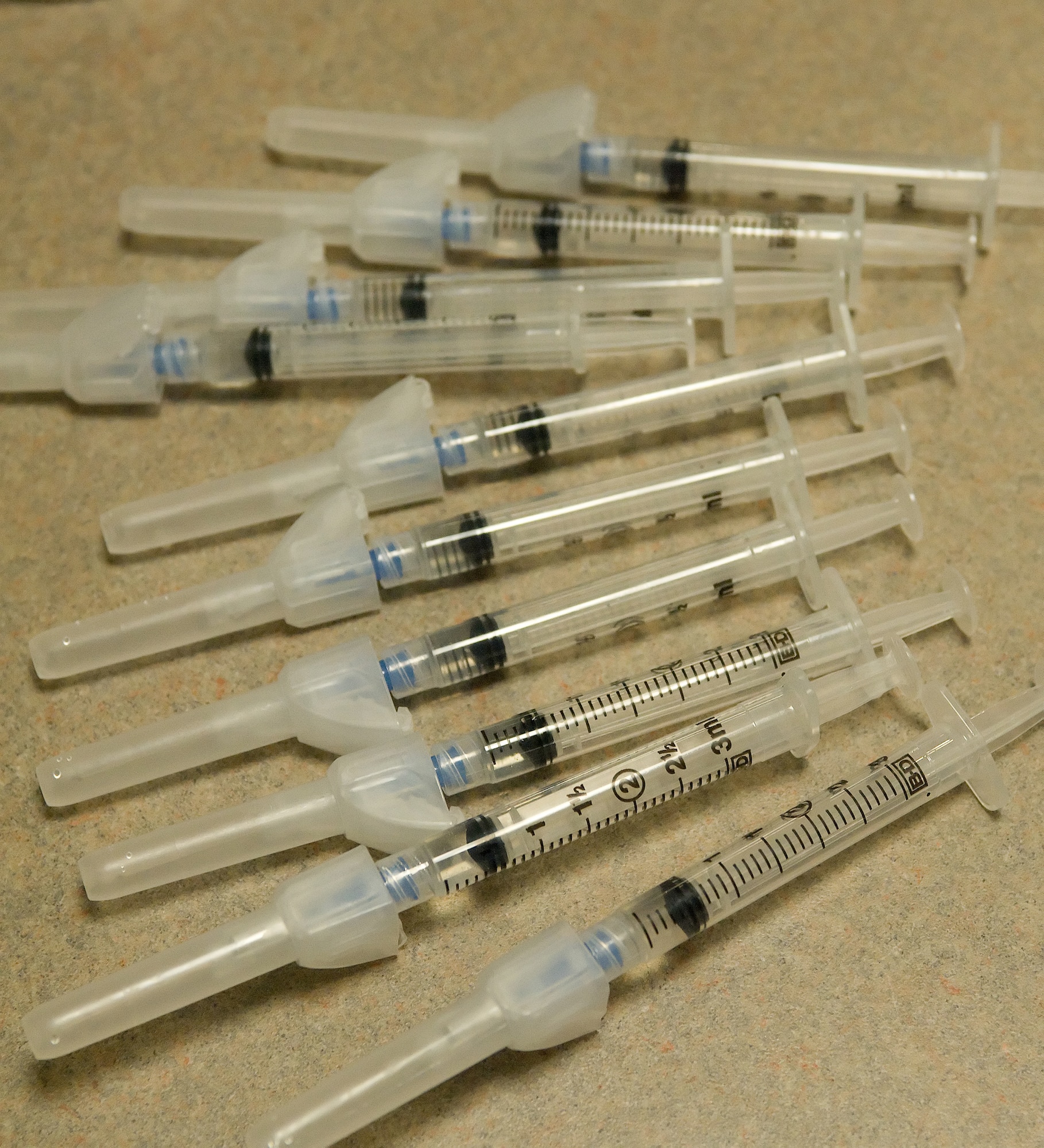 Medical technicians at the 436th Medical Group used syringes of the H1N1 influenza vaccine to inoculate against the H1N1 strain of influenza. The 436th Medical Group held inoculation sessions for Active Duty members Jan. 13 and 15. (U.S. Air Force photo/Jason Minto)