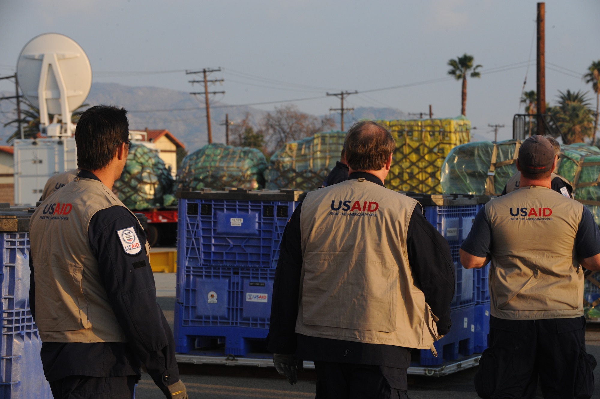 Members of the USAID urban search and rescue team from the Los Angeles County Fire Department arrange their rescue equipment at March Air Reserve Base, Calif., in preparation for their Jan. 13 flight to Port-Au-Prince, Haiti, to assist with the earthquake relief effort.  The C-17 Globemaster III that transported the 72-person team and their equipment is from the 60th Air Wing, Travis Air Force Base, Calif.  The aircraft arrived in Haiti Jan. 14. (U.S. Air Force Photo/Master Sgt. Roy Santana)