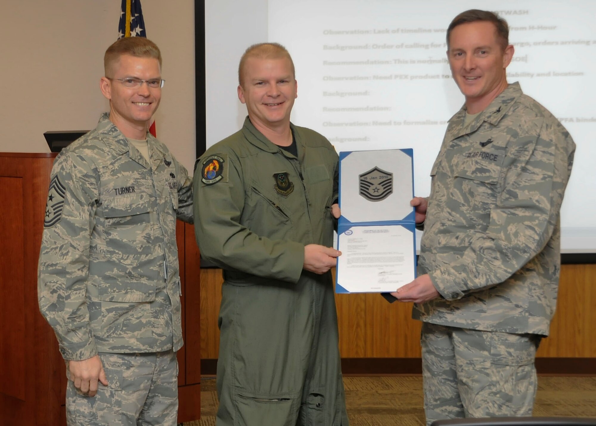 CANNON AIR FORCE BASE, N.M. -- Tech. Sgt. Edward Myers, 73rd Special Operations Squadron, was promoted to master sergeant under the Stripes for Exceptional Performer program by Command Chief Master Sgt. William Turner, 27th Special Operations Wing, and Wing Commander Col. Stephen Clark, 27 SOW here 15 Jan. The STEP program releases a limited number of stripes each year to major commmands for Airman in the ranks of staff and technical sergeant. (U.S. Air Force photo/Senior Airman Erik Cardenas)