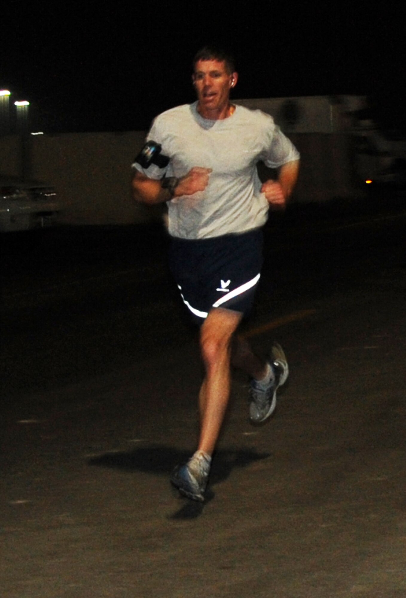 Capt. Michael Small of the 380th Air Expeditionary Wing runs during the Martin Luther King Jr. Day five-kilometer run at a non-disclosed base in Southwest Asia on Jan. 18, 2010.  More than 150 runners participated in the run.  (U.S. Air Force Photo/Senior Airman Jenifer Calhoun/Released)