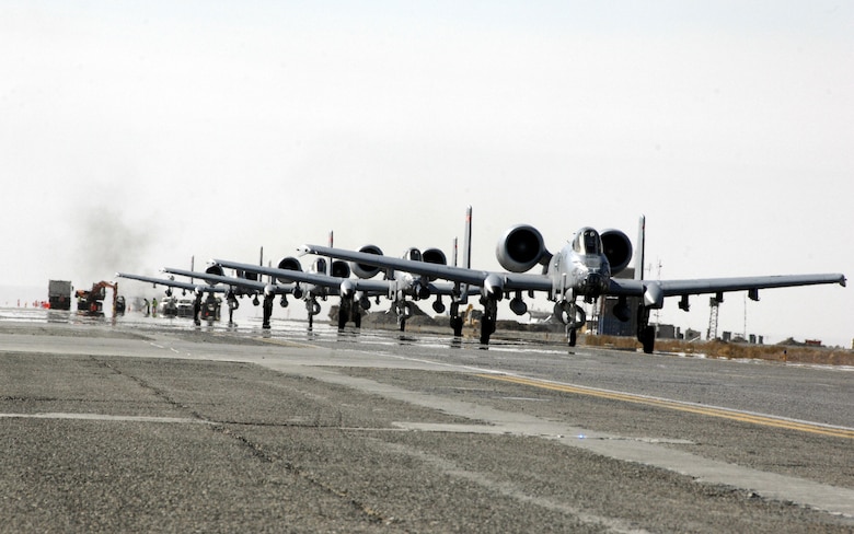 Four, of six, A-10 Thunderbolt II aircraft from the Arkansas and Maryland Air National Guard taxi down Kandahar’s runway Jan. 13, 2010. (U.S. Air Force photo/Senior Airman Timothy Taylor/Released)