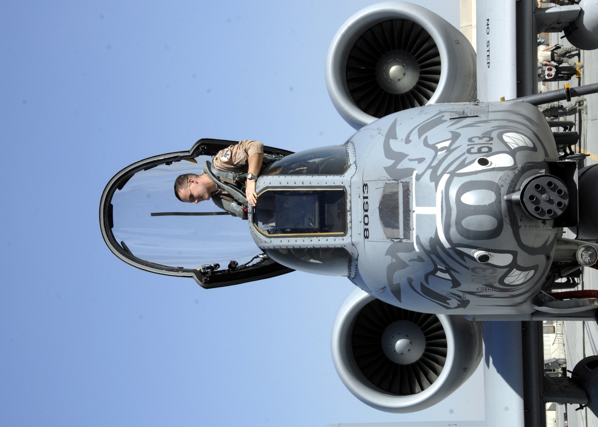 A pilot from the Maryland Air National Guard exits the cockpit of his A-10 Thunderbolt II after piloting the aircraft from his home station, Jan. 13, 2010. The transition from 354th Expeditionary Fighter Squadron to the 104th EFS is near completion after the final six A-10s taxied into their chalks. (U.S. Air Force photo/Senior Airman Timothy Taylor/Released)