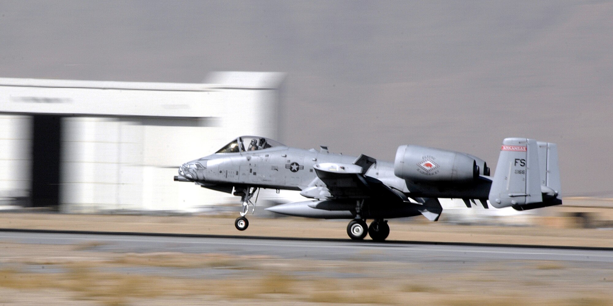 An Arkansas ANG A-10 Thunderbolt II lands at Kandahar Airfield during the change over from the 354th Expeditionary Fighter Squadron to the 104th Expeditionary Fighter Squadron, Jan. 13, 2010. (U.S. Air Force photo/Senior Airman Timothy Taylor/Released)