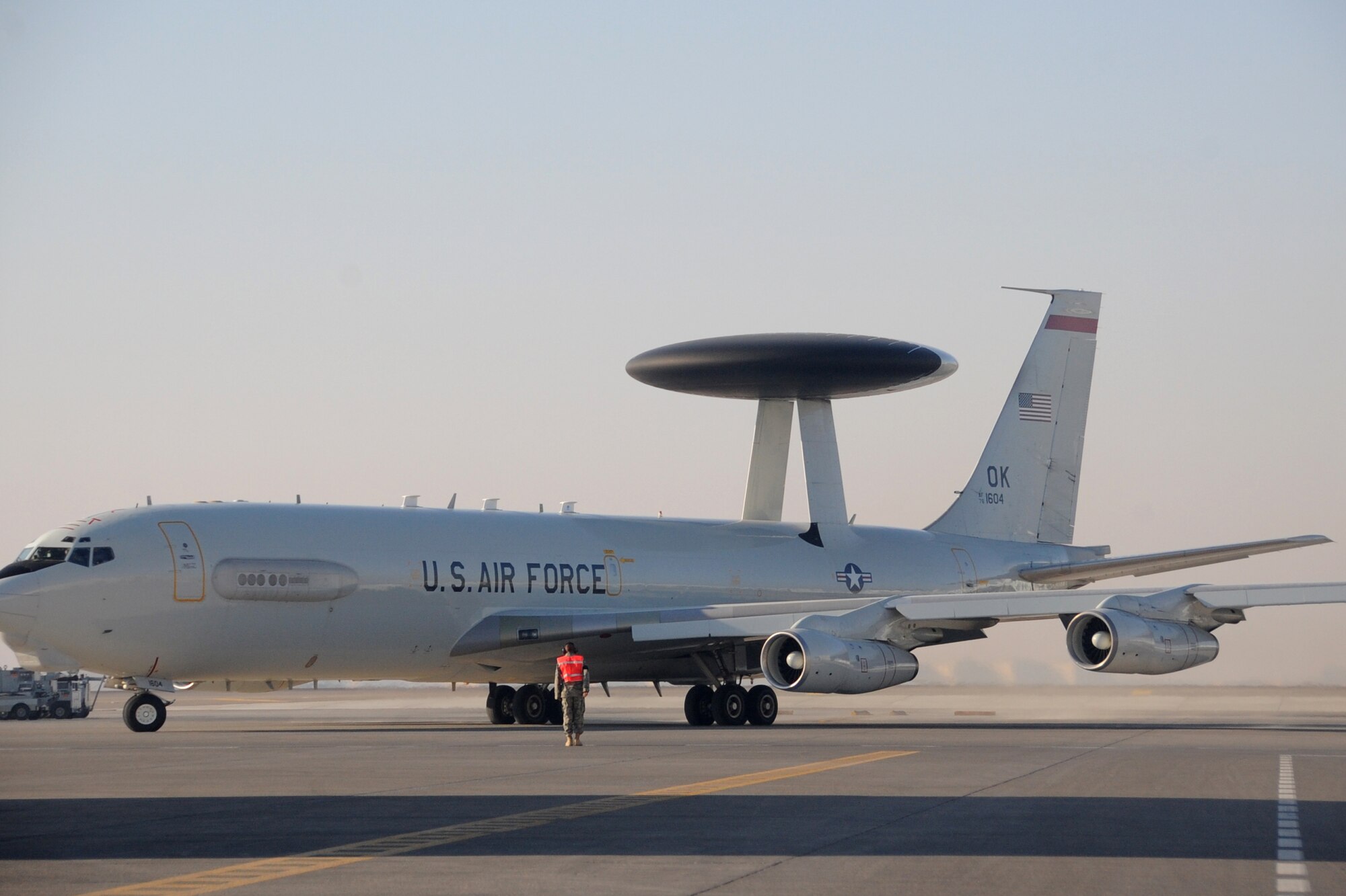 A E-3 Sentry Airborne Warning and Control System aircraft taxis out to the runway at an undisclosed location in Southwest Asia on Jan. 16.The E-3 Sentry is a modified Boeing 707/320 commercial airframe with a rotating radar dome that provides situational awareness of friendly, neutral and hostile activity, command and control of an area of responsibility, battle management of theater forces, all-altitude and all-weather surveillance of the battle space, and early warning of enemy actions during joint, allied, and coalition operations. (U.S. Air Force photo/Senior Airman Jenifer H. Calhoun/Released)
