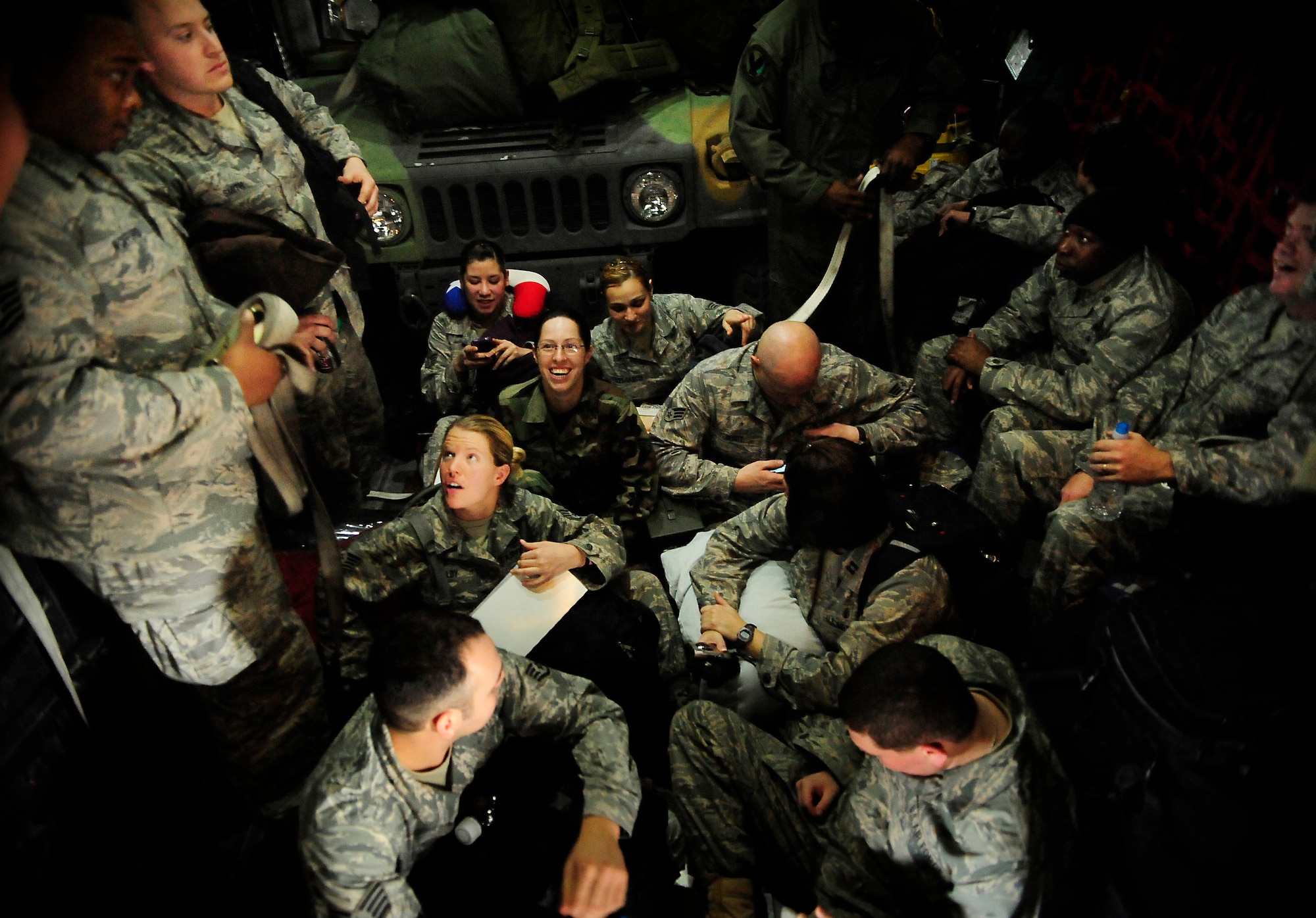 The 6th Medical Group Mobile Aeromedical Staging Facility (MASF) team prepares to depart on a C-130 aircraft for humanitarian relief to Haiti from MacDill Air Force Base, Fla., Jan. 20. The 13-personnel MASF team from MacDill contains nurses, aeromedical technicians, and administrators who will provide medical treatment to victims of the massive Haiti earthquake which occured on Jan. 12. (U.S. Air Force photo by Senior Airman Rylan Albright)