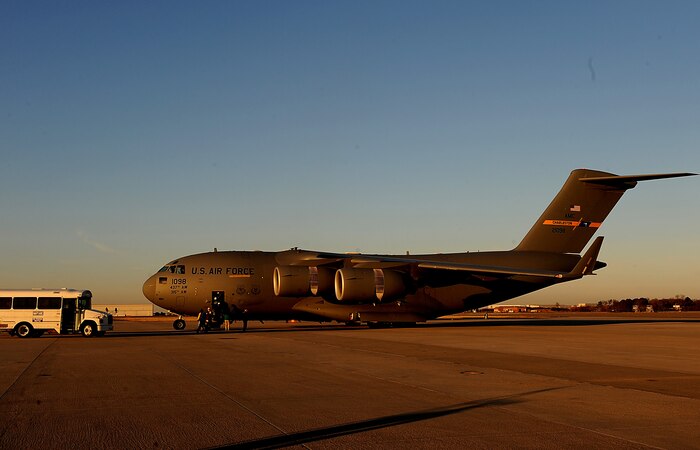 A C-17 Globemaster III aircraft from Charleston Air Force Base, S.C., prepares to depart Norfolk, Va., Jan. 15, 2010, carrying members of Virginia Task Force 2 Urban Search and Rescue to Haiti for earthquake relief operations. Virginia Task Force 2 is a specialized rescue organization comprised of highly trained firefighters, emergency medial personnel, dog handlers, engineers and physicians. The task force deployed in support of Haiti relief operations. (U.S. Air Force photo by Master Sgt. Jeremy Lock/Released)