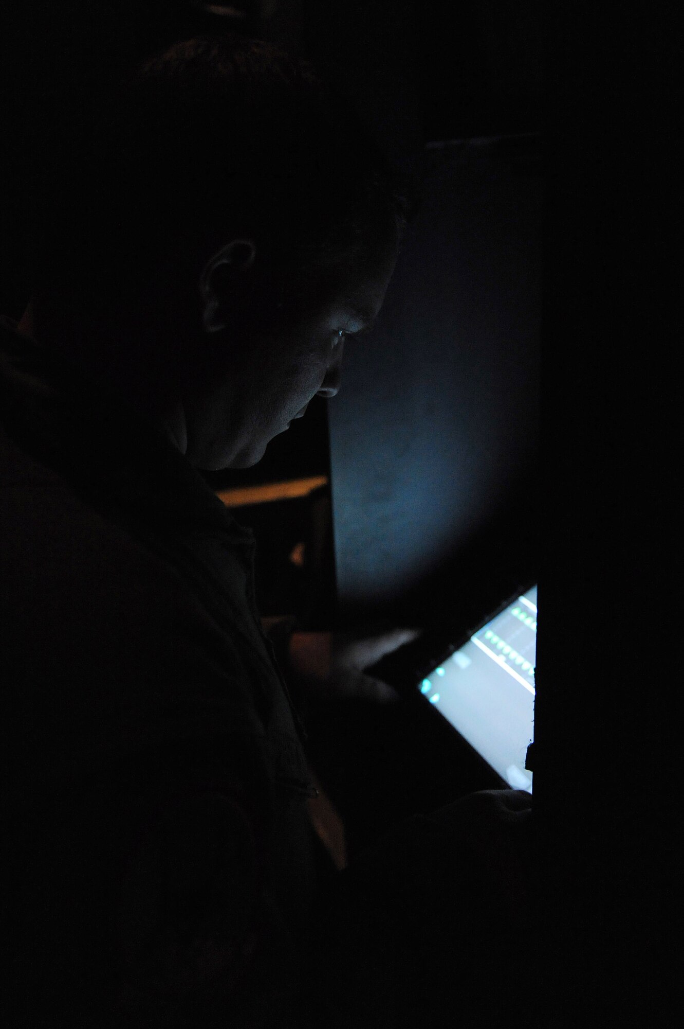 U.S. Air Force Staff Sgt. Lynzey Thorton, 41st Airlift Squadron loadmaster from Little Rock Air Force Base, Ark., inputs cargo load information into the Multifunction Control Display Unit of a C-130J at Pope Air Force Base, N.C., Jan. 19, 2010.  Little Rock AFB is a component of Air Mobility Command. Since Jan. 13, AMC has delivered more than 1,600 tons of supplies to the region as part of Operation Unified Response. AMC aircraft and personnel continue to support the international effort to increase the velocity with which aid is flowing to those in need. (U.S. Air Force photo/Staff Sgt. Chad Chisholm) 