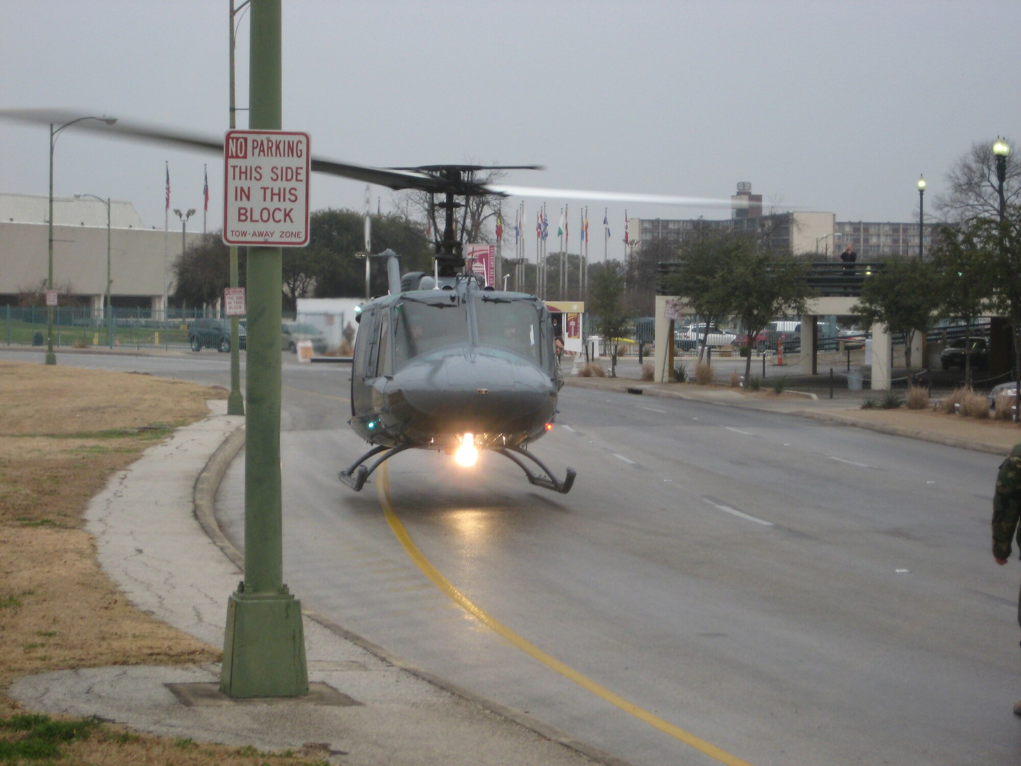 A TH-1H lands in downtown San Antonio Jan. 13 as part of the 58th Special Operations Wing display at the 2010 Air Education and Training Command Symposium. The TH-1H, an upgraded version of the UH-1H, is the newest training aircraft in AETC.  The aircraft was flown by Maj. Rod Butz, 23rd Flying Training Squadron instructor pilot, Fort Rucker, Ala. (U.S. Air Force courtesy photo)