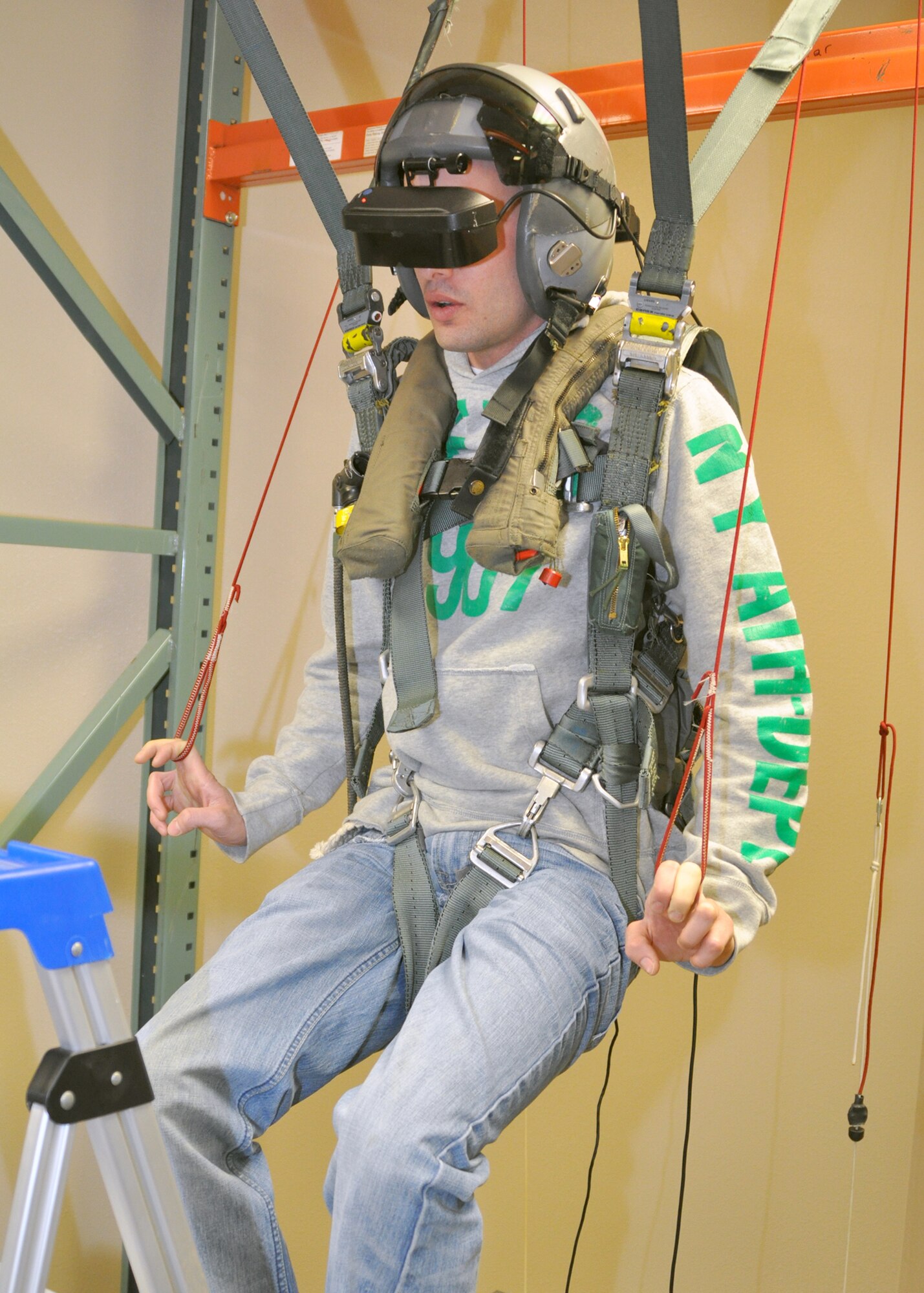 Brian Crowe, a civilian contractor working out of Claiborne Range, located three hours South of Barksdale Air Force Base, La., attempts to land safely using virtual reality simulation requiring him to maneuver himself by parachute after being ejected from an aircraft. Crowe got the opportunity to test out this training tool at the 47th Fighter Squadron during a tour of Barksdale on Jan. 13, 2010. Claiborne Range is an air-to-ground gunnery range is used by the 47th Fighter Squadron for A-10 Thunderbolt II training. (U.S. Air Force Photo/Senior Airman Crystal Marie Jordan)