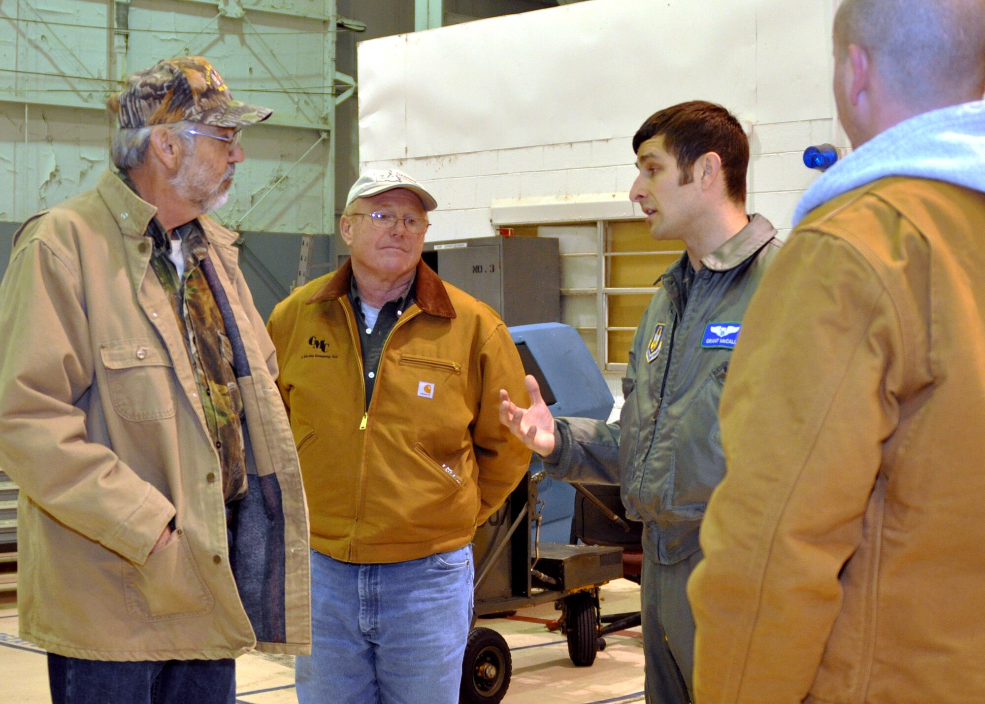 Capt. Grant McCall, an A-10 Thunderbolt II pilot attached to the 47th Fighter Squadron on Barksdale Air Force Base, La., briefs three civilian contractors from the Claiborne Range during a tour of the base on Jan. 13, 2010. Claiborne Range, located three hours South of Barksdale, was transferred to the Air Force Reserves in 1992. Today, the range is used by the 47th FS as an air-to-ground gunnery range.(U.S. Air Force Photo/Senior Airman Crystal Marie Jordan)