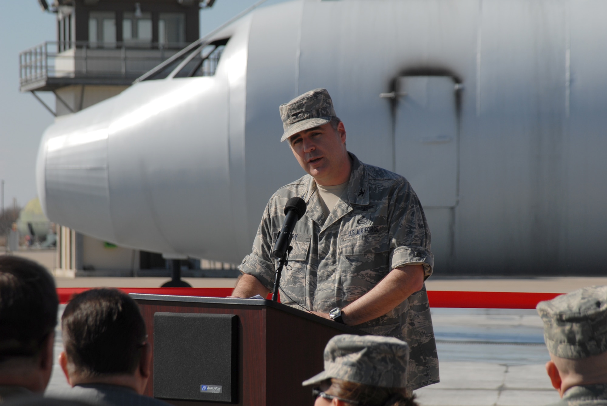 GOODFELLOW AIR FORCE BASE, Texas -- Col. Thomas Geary, 17th Training Wing commander, speaks about the features and benefits of the new large frame aircraft trainer at the ribbon-cutting ceremony, Jan. 20, 2010. The new trainer replaces the 11 year old trainer that had become unsafe due to extensive use. (U.S. Air Force photo/Staff Sgt. Laura McFarlane)
