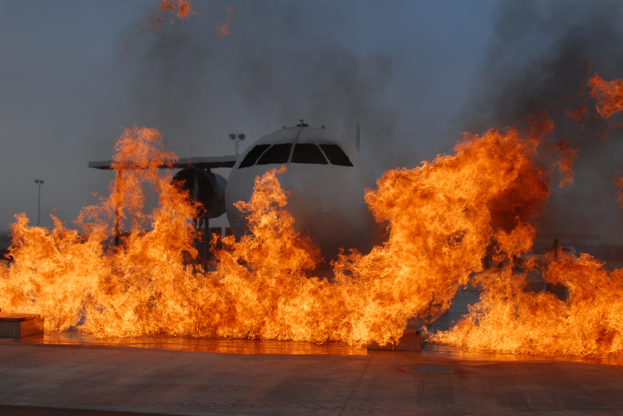 GOODFELLOW AIR FORCE BASE, Texas -- A test burn is performed on the new large frame aircraft trainer at the Louis F. Garland Department of Defense Fire Academy, Dec. 17, 2009. The new trainer replaces the 11 year old trainer that had become unsafe due to extensive use. (U.S. Air Force photo/Staff Sgt. Laura R. McFarlane)
