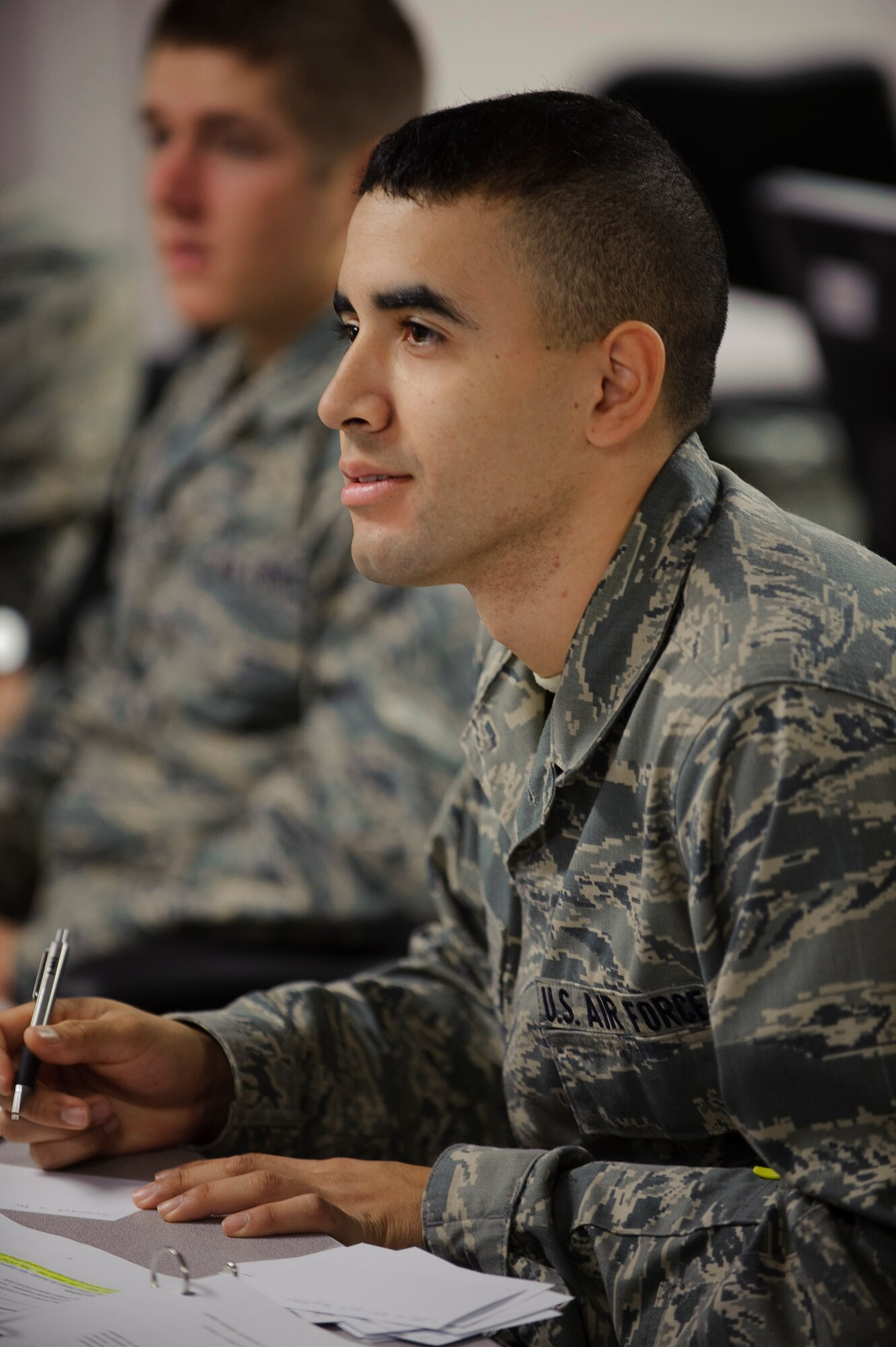 Airman Basic Luis Zayas, a Basic Sensor Operator Course student, listens during a review of the previous day’s lesson on the electromagnetic spectrum during phase one of the Remotely Piloted Aircraft sensor operator training taught by 12th Operations Group, Det. 1, at Randolph Air Force Base, Texas, Jan. 19, 2010. (U.S. Air Force photo/Steve Thurow)