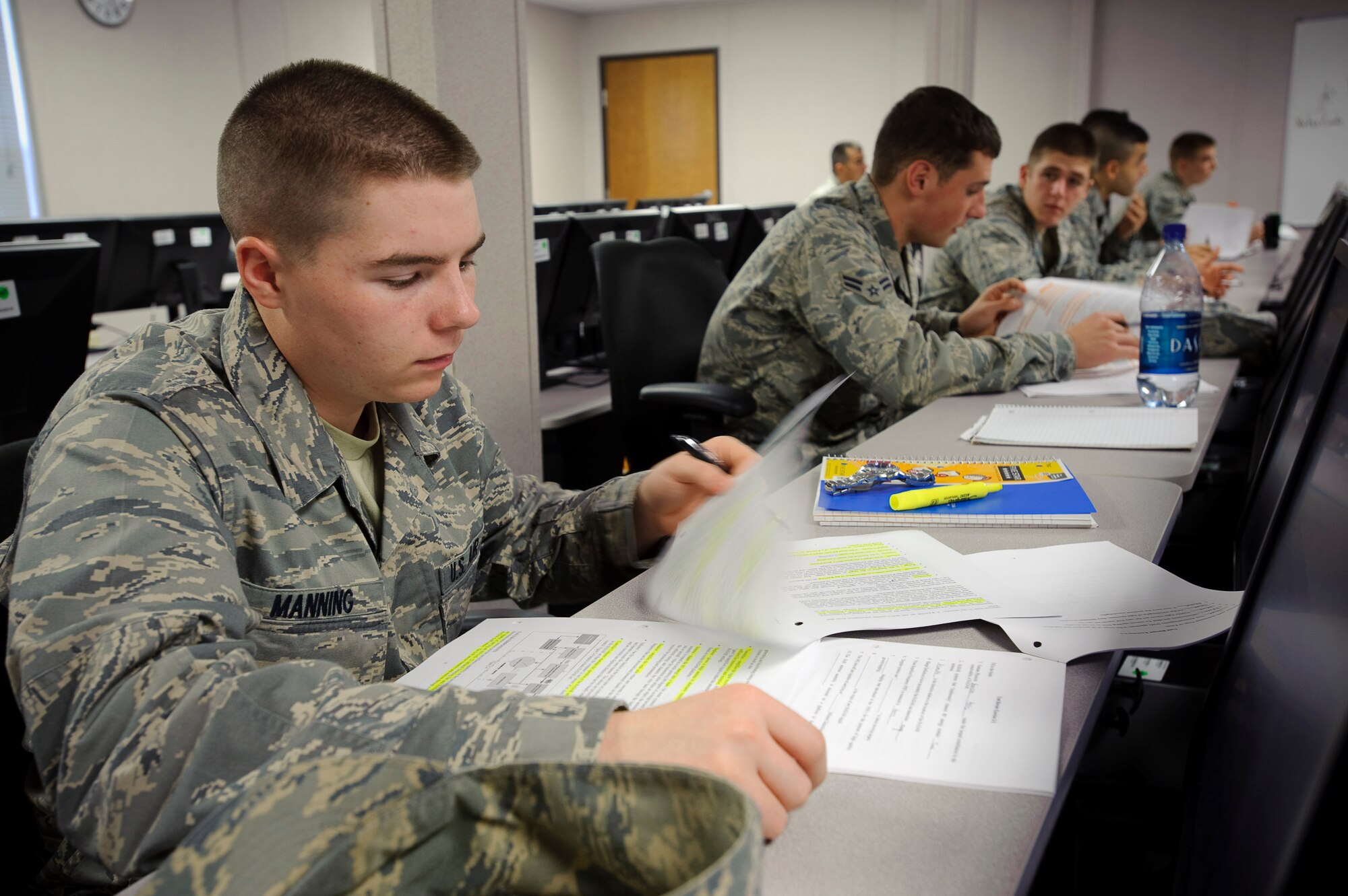 Airman Basic Corey Manning, a Basic Sensor Operator Course student, reviews his student workbook during phase one of the Remotely Piloted Aircraft sensor operator training taught by 12th Operations Group, Det. 1, at Randolph Air Force Base, Texas, Jan. 19, 2010. (U.S. Air Force photo/Steve Thurow)