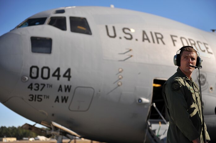 Air Force Tech. Sgt. Chad Buttler conducts a preflight check on his C-17 Globemaster III cargo aircraft Jan. 18, 2010, at Pope Air Force Base in Fayetteville, N.C., before taking off for a humanitarian mission to Haiti. The C-17 and crew conducted the first humanitarian air delivery mission over Haiti to test the feasibility of future missions in speeding along the flow of supplies into the country. Sergeant Butler is a flying crew chief from the 437th Aircraft Maintenance Squadron at Charleston Air Force Base, S.C. (U.S. Air Force photo by Master Sgt. Shane A. Cuomo/Released)