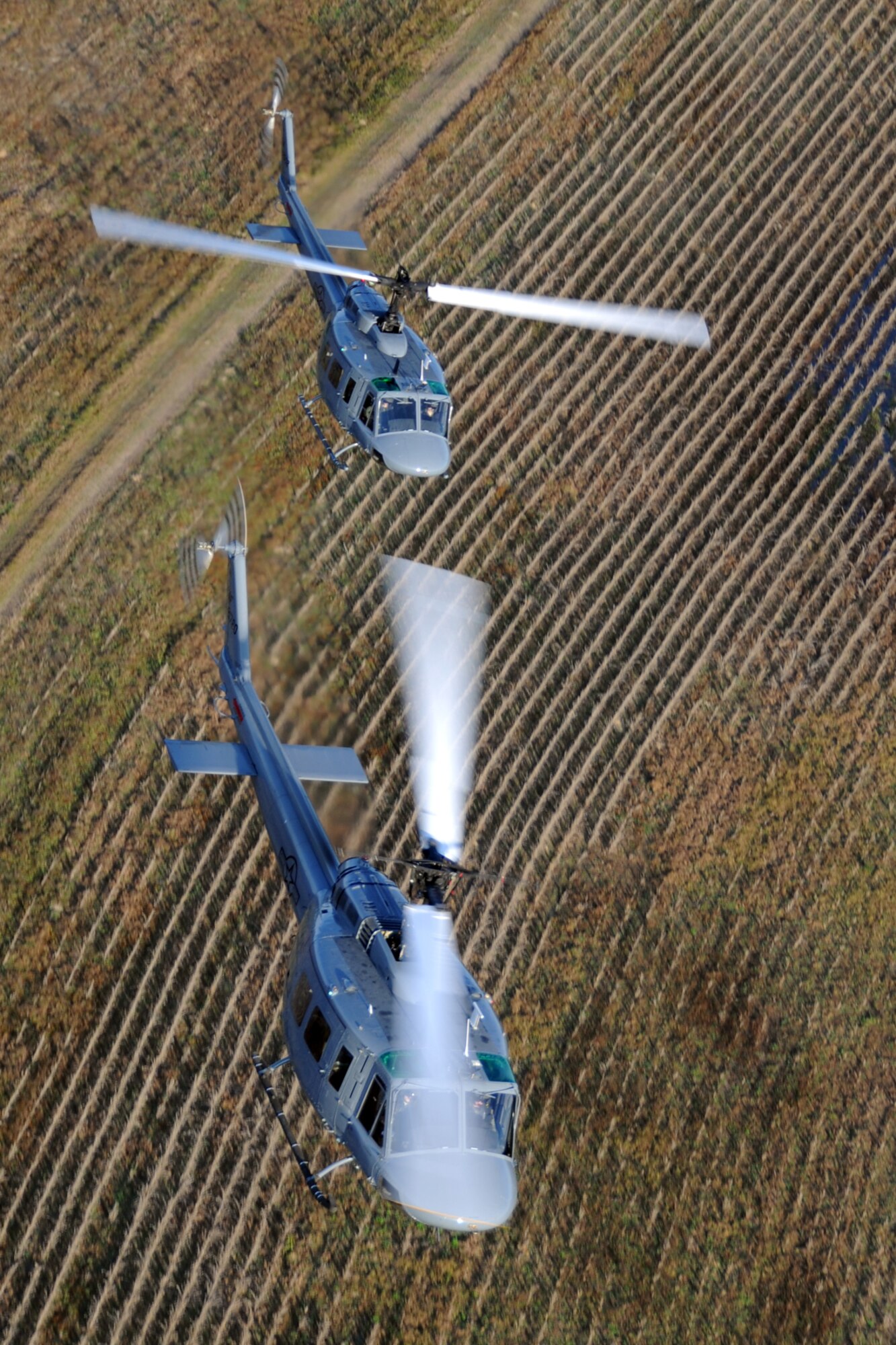 Students from the 23rd Flying Training Squadron at Fort Rucker, Ala., piloting UH-1H Iroquois helicopters, practice formation-flight patterns.  The 23rd FTS is the third and final phase of undergraduate pilot training before the student pilots can obtain their wings.  It is the Air Force's primary source of helicopter pilot training for special operations, combat search and rescue, missile support and distinguished visitor airlift missions. (U.S. Air Force photo/Airman 1st Class Anthony Jennings)