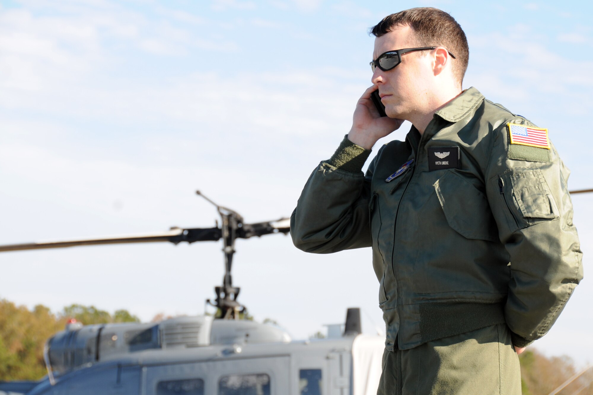 1st Lt. Wyeth Lindeke, a first assignment instructor pilot with the 23rd Flying Training Squadron at Fort Rucker, Ala., coordinates flight plans with other pilots before a training mission.  The 23rd FTS is the third and final phase of undergraduate pilot training before the student pilots can obtain their wings.  It is the Air Force's primary source of helicopter pilot training for special operations, combat search and rescue, missile support and distinguished visitor airlift missions. (U.S. Air Force photo/Airman 1st Class Anthony Jennings)