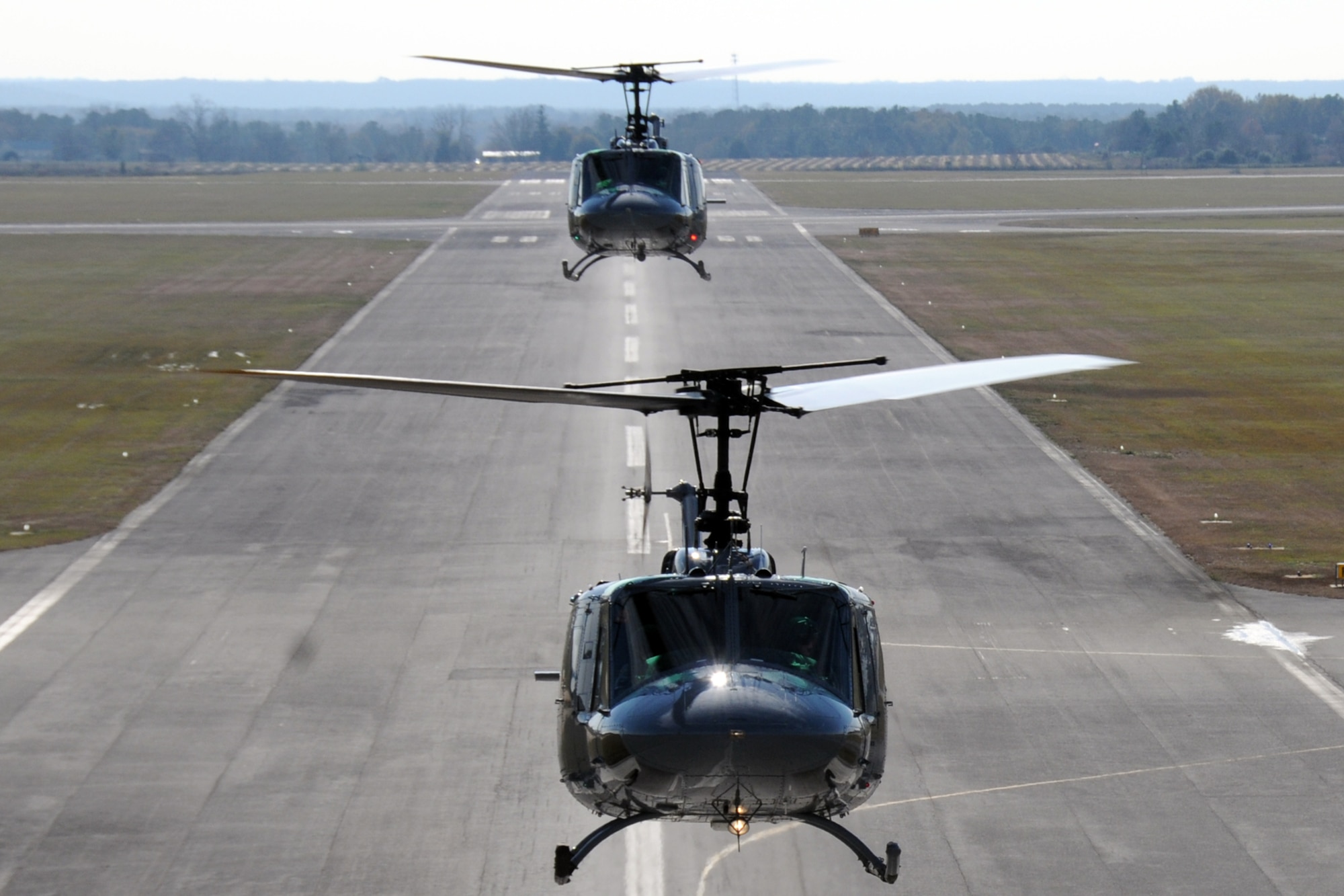 Students from the 23rd Flying Training Squadron at Fort Rucker, Ala., piloting UH-1H Iroquois helicopters, practice formation-flight patterns.  The 23rd FTS is the third and final phase of undergraduate pilot training before the student pilots can obtain their wings.  It is the Air Force's primary source of helicopter pilot training for special operations, combat search and rescue, missile support and distinguished visitor airlift missions. (U.S. Air Force photo/Airman 1st Class Anthony Jennings)