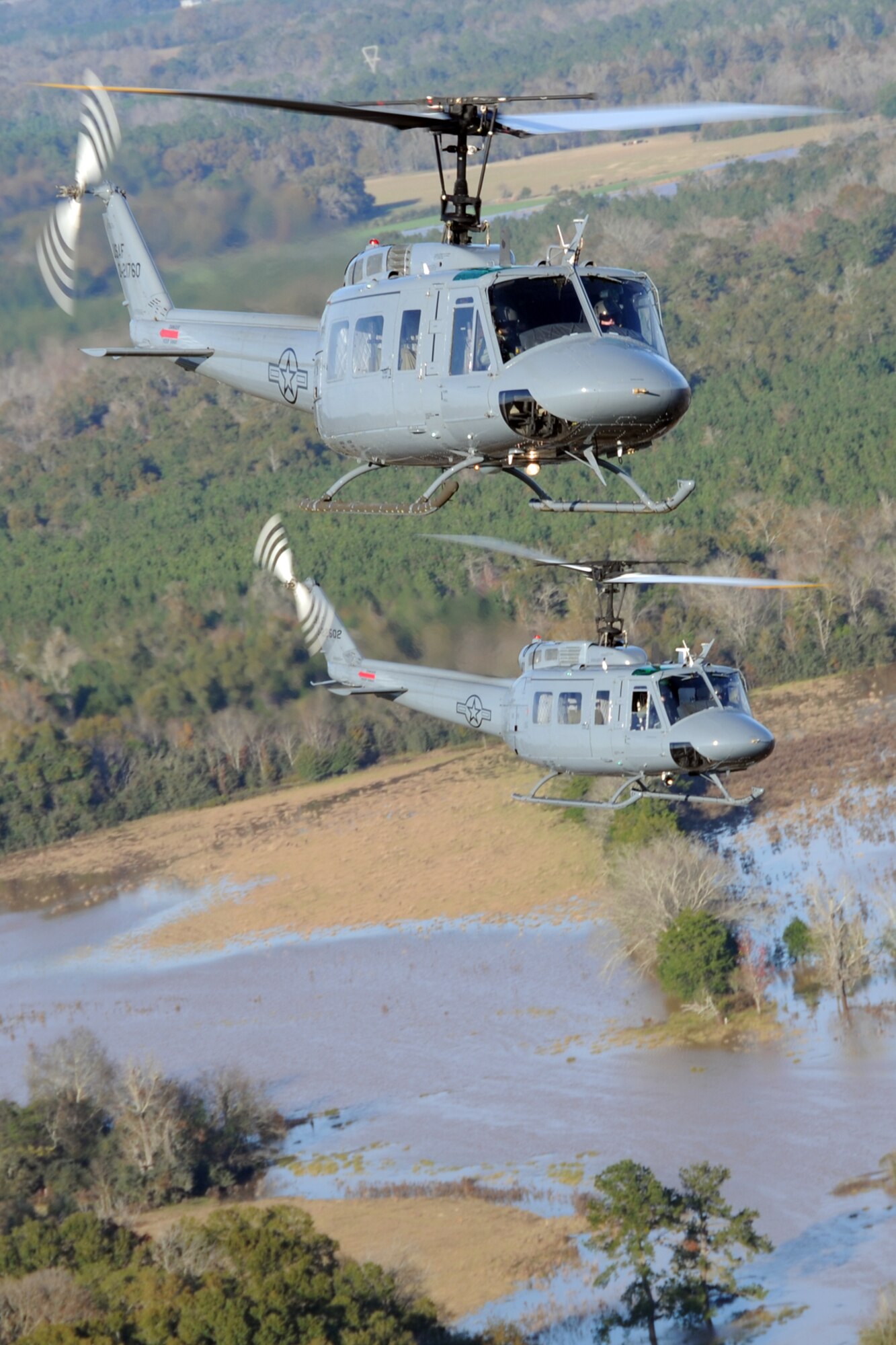 Students from the 23rd Flying Training Squadron at Fort Rucker, Ala., piloting UH-1H Iroquois helicopters, practice formation-flight patterns.  The 23rd FTS is the third and final phase of undergraduate pilot training before the student pilots can obtain their wings.  It is the Air Force's primary source of helicopter pilot training for special operations, combat search and rescue, missile support and distinguished visitor airlift missions. (U.S. Air Force photo/Airman 1st Class Anthony Jennings)