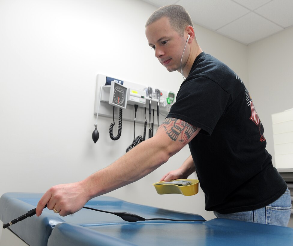 LANGLEY AIR FORCE BASE, Va. -- Airman 1st Class Jasen White, 633d Medical Operations Squadron medic, sets up one of the exam rooms on the first floor of the USAF Langley Hospital addition Jan. 17.  Renovation of the old hospital wing and the main Dental Clinic will begin soon and continue for approximately two years.  (U.S. Air Force photo/Senior Airman Zachary Wolf)