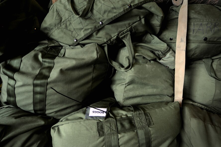 MOODY AIR FORCE BASE, Ga. -- Mobility bags are placed on a pallet here Jan. 20, as Airmen prepare equipment for a short-notice deployment to Haiti. Approximately 70 Airmen from the 823rd Security Forces Squadron will be providing security at the Toussaint Louverture International Airport in Haiti’s capital, Port-au-Prince. (U.S. Air Force photo by Senior Airman Gina Chiaverotti-Paige) 
