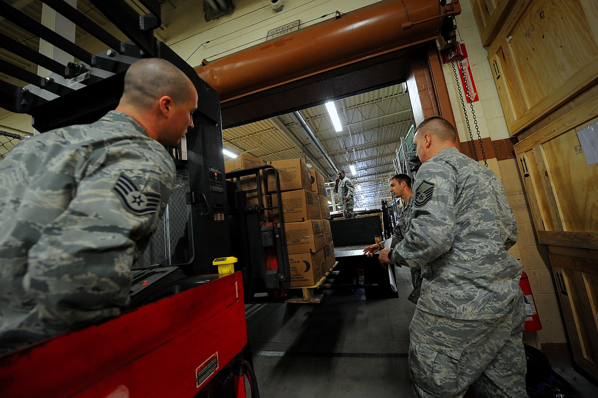 MOODY AIR FORCE BASE, Ga. -- Staff Sgt. Joseph Brown, 820th Security Forces Group, moves a pallet of Meals, Ready to Eat onto a truck here Jan. 20. The rations of MREs and water will be issued to members of the 823rd Security Forces Squadron for their deployment to Haiti. (U.S. Air Force photo by Senior Airman Gina Chiaverotti-Paige) 
