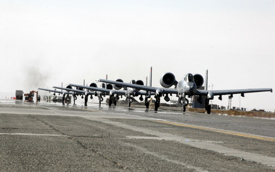 The last four A-10 Thunderbolt II "Warthogs" with the 188th Fighter Wing of the Arkansas Air National Guard and 175th Fighter Wing of the Maryland Air National Guard land at Kandahar Airfield during the transition from the 354th Expeditionary Fighter Squadron to the 104th EFS, Jan. 13, 2010. (U.S. Air Force photo by Senior Airman Timothy Taylor)
