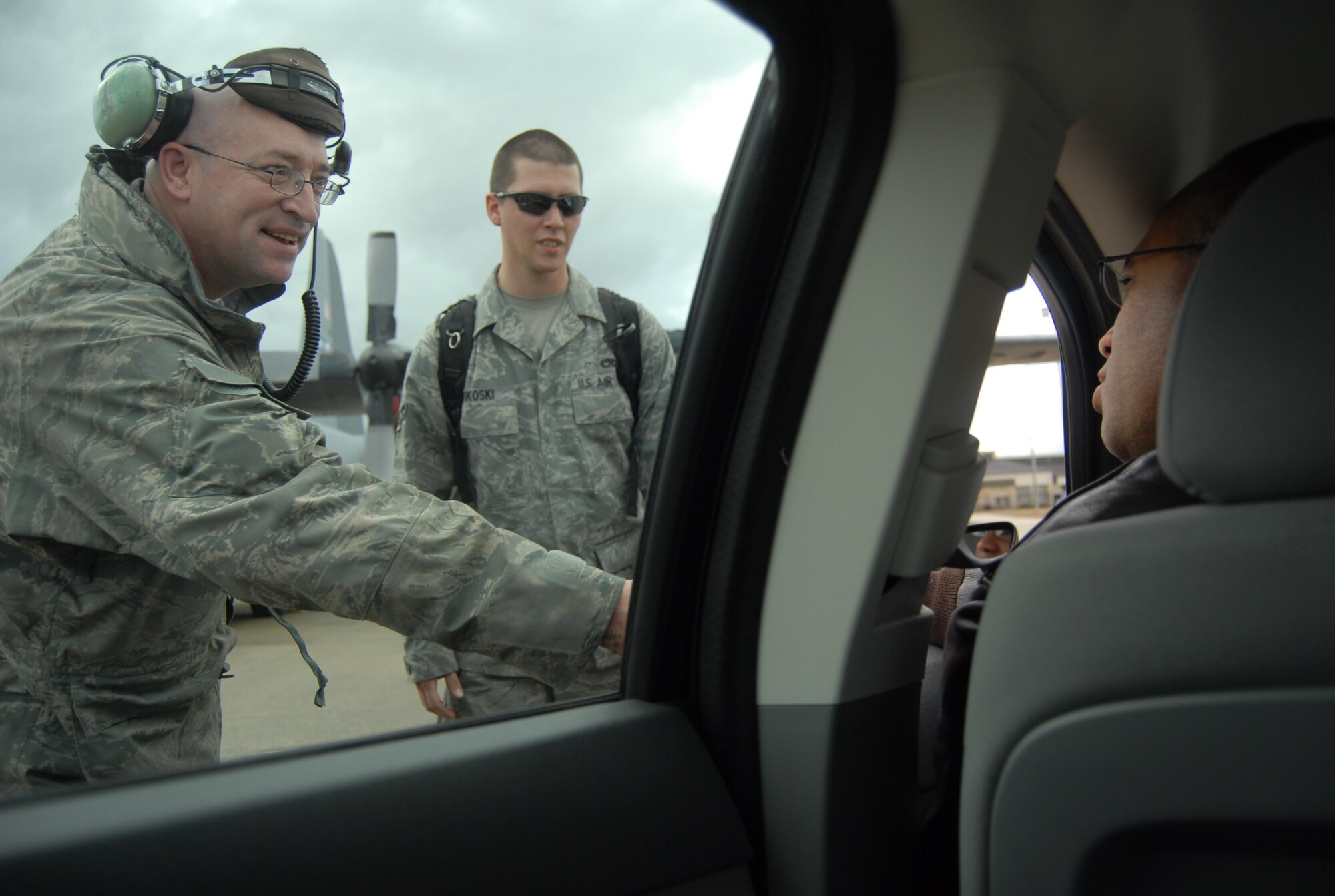 Col. James Johnson, 43rd Airlift Wing Commander greets several crew chiefs from Dyess Air Force Base, Texas on Jan. 15. The crew chiefs are performing inspections on Dyess AFB aircraft parked on Pope’s airfield. The aircraft will be loaded with supplies, equipment and personnel to be sent to Haiti in support of relief efforts after a 7.0 earthquake devastated the island nation Jan. 12. Popes airfield is being used as a staging ground for airlift operations, both military and civilian, into Haiti. (U.S. Air Force photo/Senior Airman Kris Levasseur)