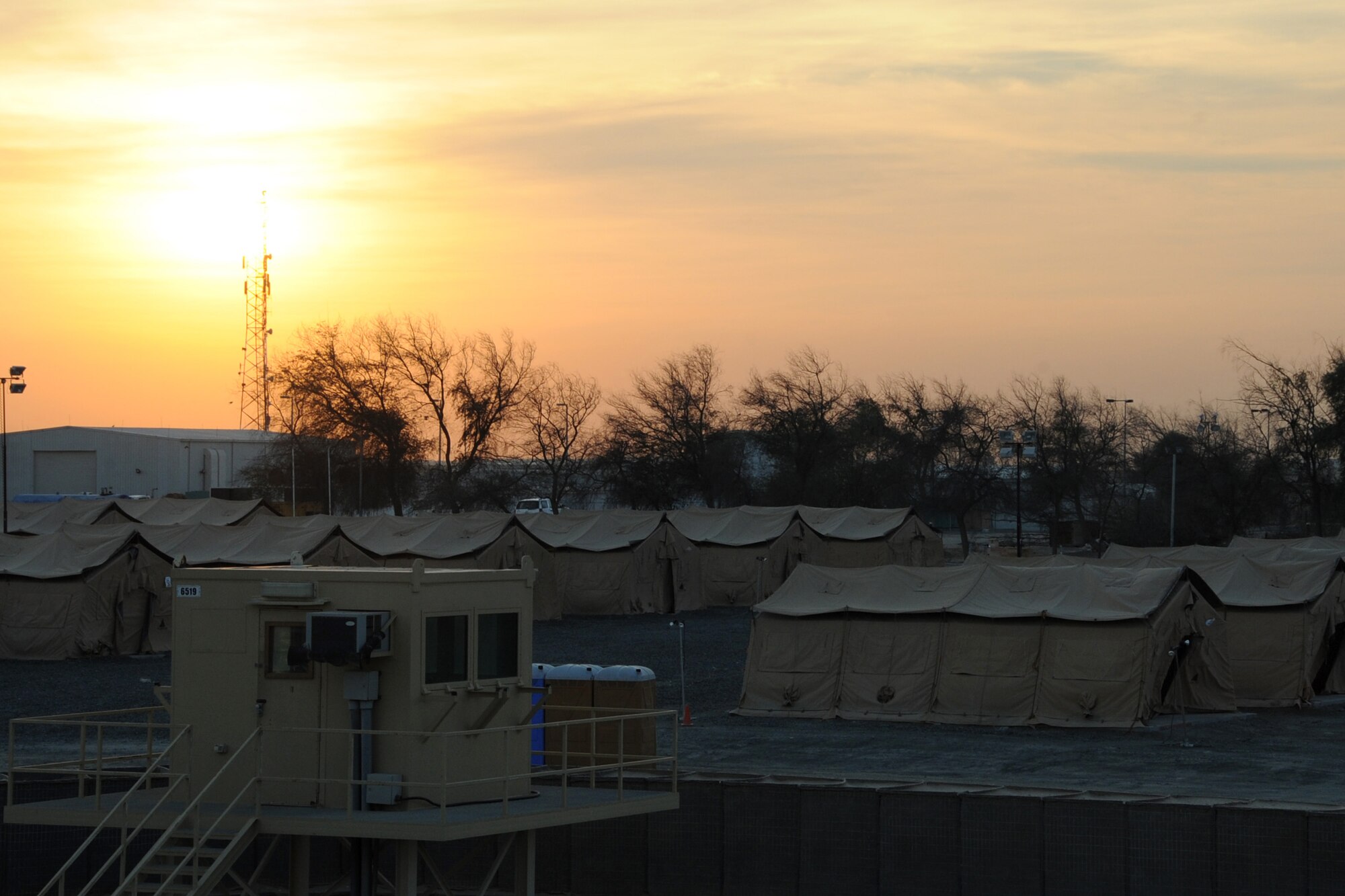 The suns sets over the 380th Air Expeditionary Wing at an undisclosed location in Southwest Asia on Jan. 20, 2010. the 380th Air Expeditionary Wing, supports Operations Iraqi Freedom and Enduring Freedom and the Combined Joint Task Force-Horn of Africa. The 380th AEW is comprised of four groups and 12 squadrons and the wing's deployed mission includes air refueling, surveillance and reconnaissance in support of overseas contingency operations in Southwest Asia. (U.S. Air Force photo/Senior Airman Jenifer H. Calhoun/Released)
