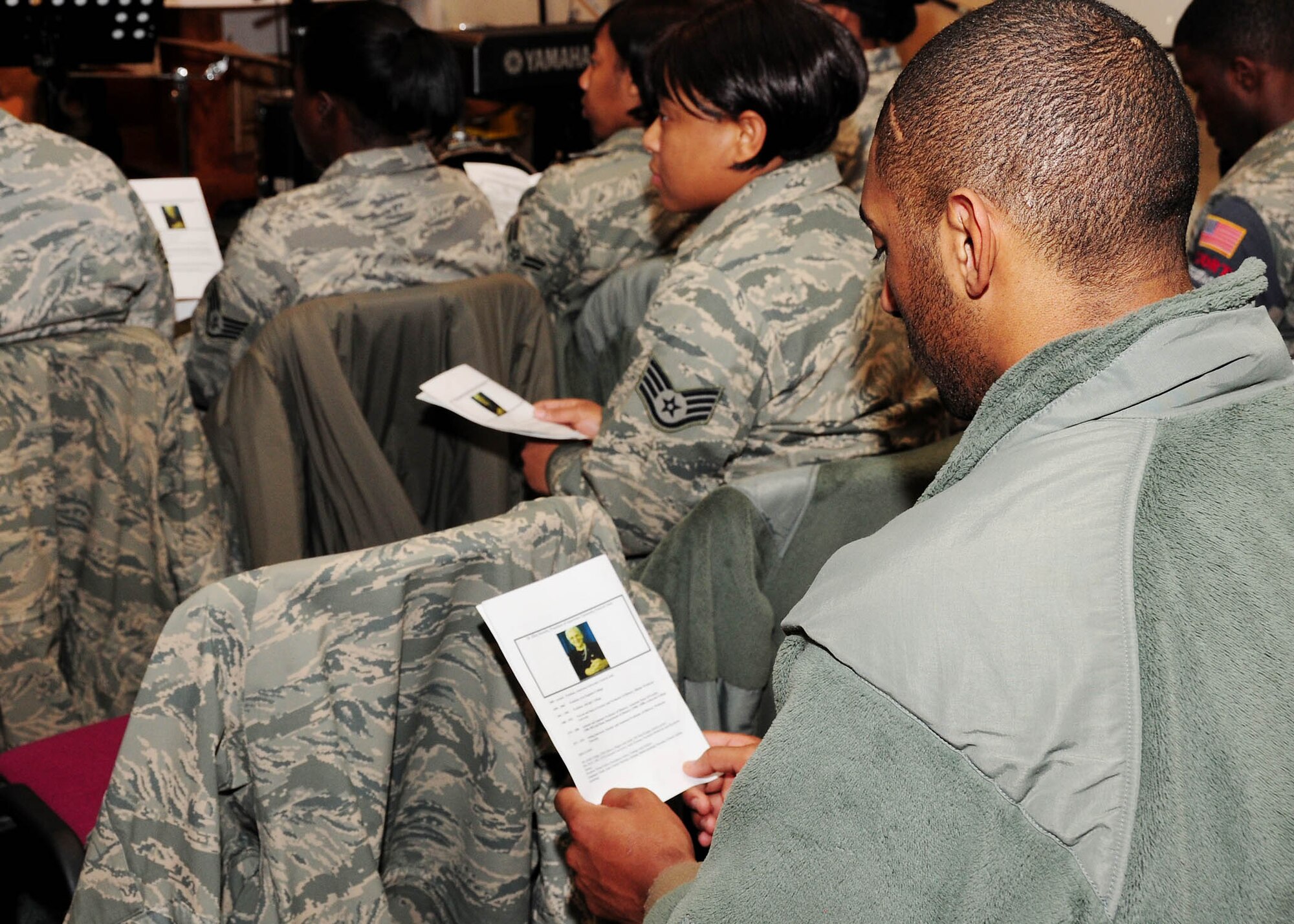 Senior Airman Armand Boddie, 376th Logistics Readiness Squadron, reviews the biography of the guest speaker during the Martin Luther King, Jr. remembrance ceremony at the Transit Center at Manas, Kyrgyzstan, Jan. 18, 2009 (U.S Air Force photo/Senior Airman Nichelle Anderson/released)