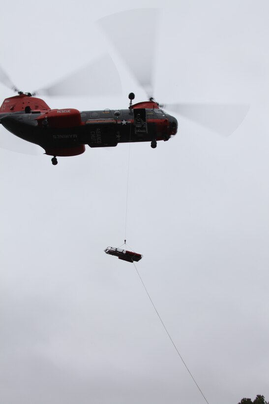 The Pedro team trains for medical evacuation situations at Atlantic field, Jan. 21. “The ground team must simulate what they will do to airlift a person to a safe zone or hospital without a body, due to rules against using a real person for the situation,” said Sgt. Phillip W. Cambron a search and rescue crew chief for VMR-1.