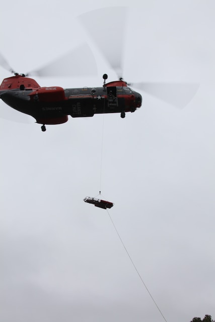 The Pedro team trains for medical evacuation situations at Atlantic field, Jan. 21. “The ground team must simulate what they will do to airlift a person to a safe zone or hospital without a body, due to rules against using a real person for the situation,” said Sgt. Phillip W. Cambron a search and rescue crew chief for VMR-1.