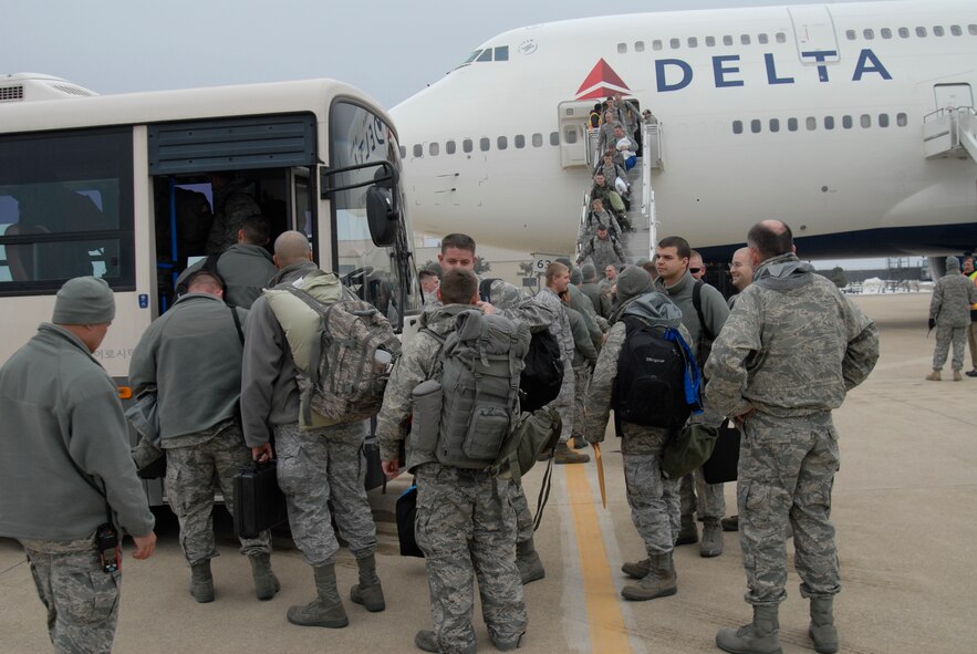 KUNSAN AIR BASE, Republic of Korea -- Members from Mountain Home Air Force Base, Idaho, arrive here and are greeted by the 8th Fighter Wing leadership Jan. 19. More than 300 Mountain Home members rotated out with member from Mountain Home as well. (U.S. Air Force photo by/Staff Sgt. Darnell Cannady)