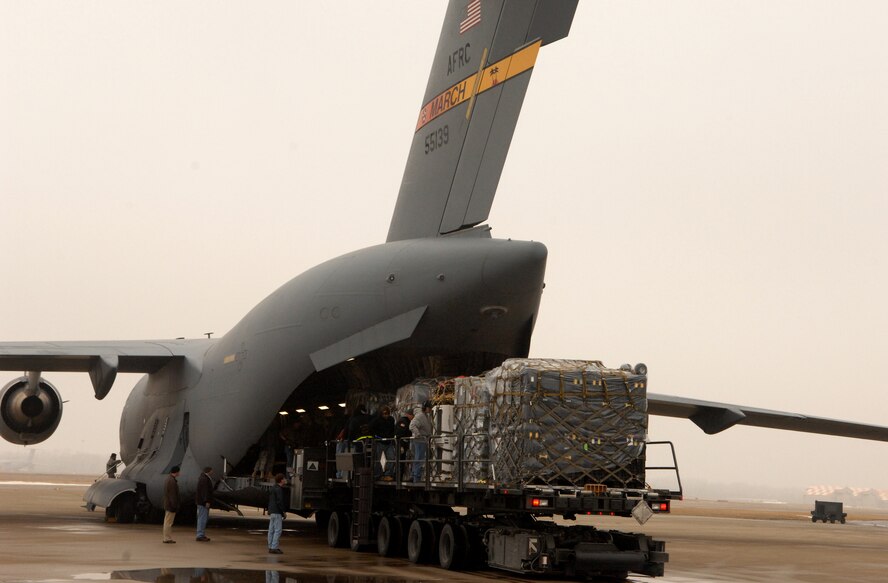 A C-17A Globemaster crew from the 729th Airlift Squadron, out of March, Air Reserve Base, CA., along with Wright-Patterson AFB personnel load FEMA supplies and equipment  on Saturday, January 16th, 2010, at Wright-Patterson AFB, Ohio which are bound for the Port -au-Prince International Airport, Haiti.  The C-17 and crew, both out of the 452nd Air Mobility Wing at March Air Reserve Base, are taking part in the massive international effort to assist in rescue, recover and humanitarian efforts following a 7.0 earthquake. President Barack Obama ordered a swift and aggressive rescue effort.  The January 12, 2010 quake, centered near the island nation's capital of Port-au-Prince, has left untold numbers of residents homeless, injured or dead.(U.S. Air Force photo by Master Sgt. Dawn Price/released)