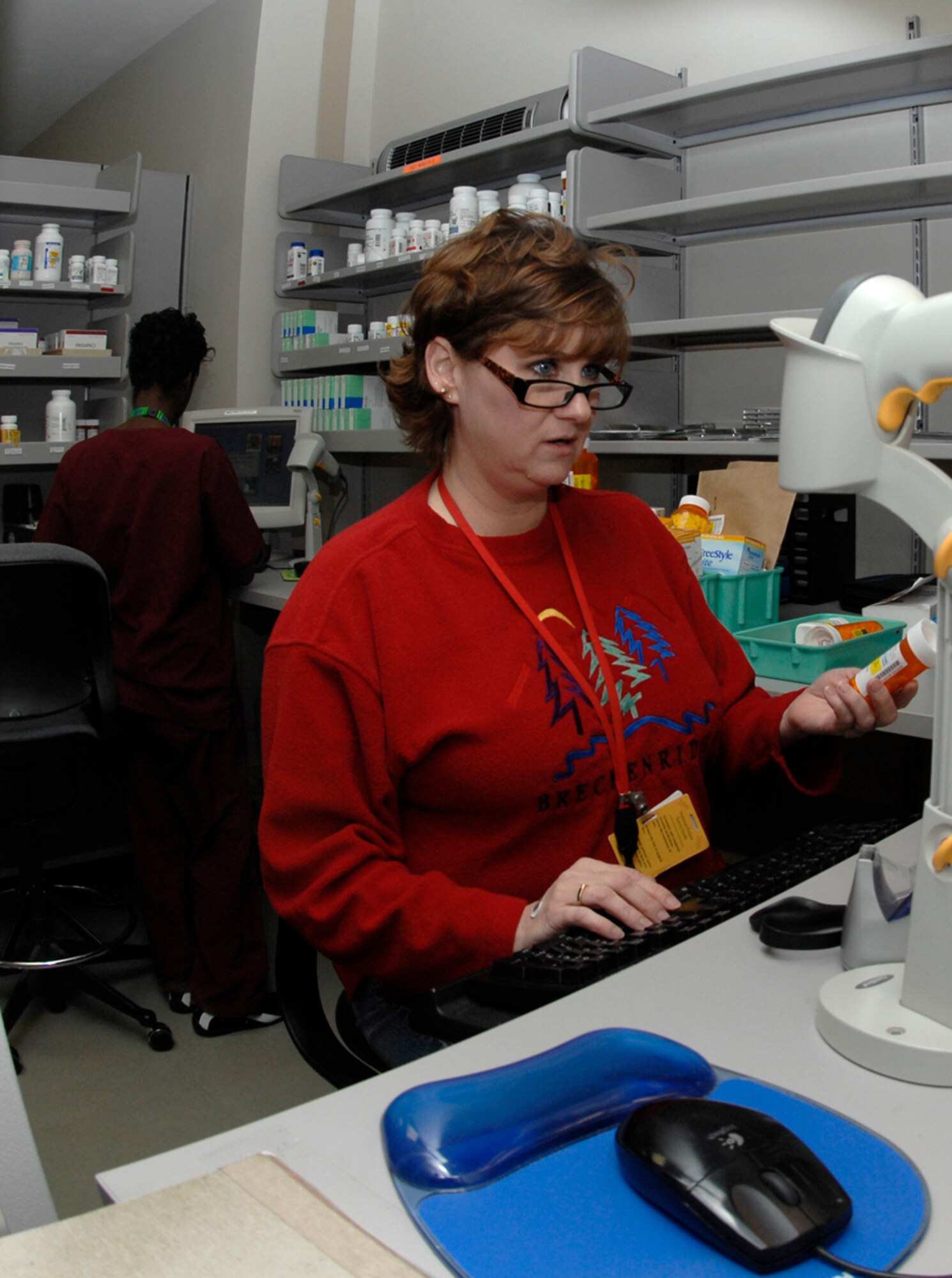 Vonda Bauer, a 22nd Medical Support Squadron pharmacist, verifies filled prescriptions at the base pharmacy, Jan. 5, 2010. The clinic pharmacy has more than 530 drugs on formulary, not including different strengths of medications they prescribe to customers.  (U.S. Air Force Photo/Airman 1st Class Justin Shelton)
