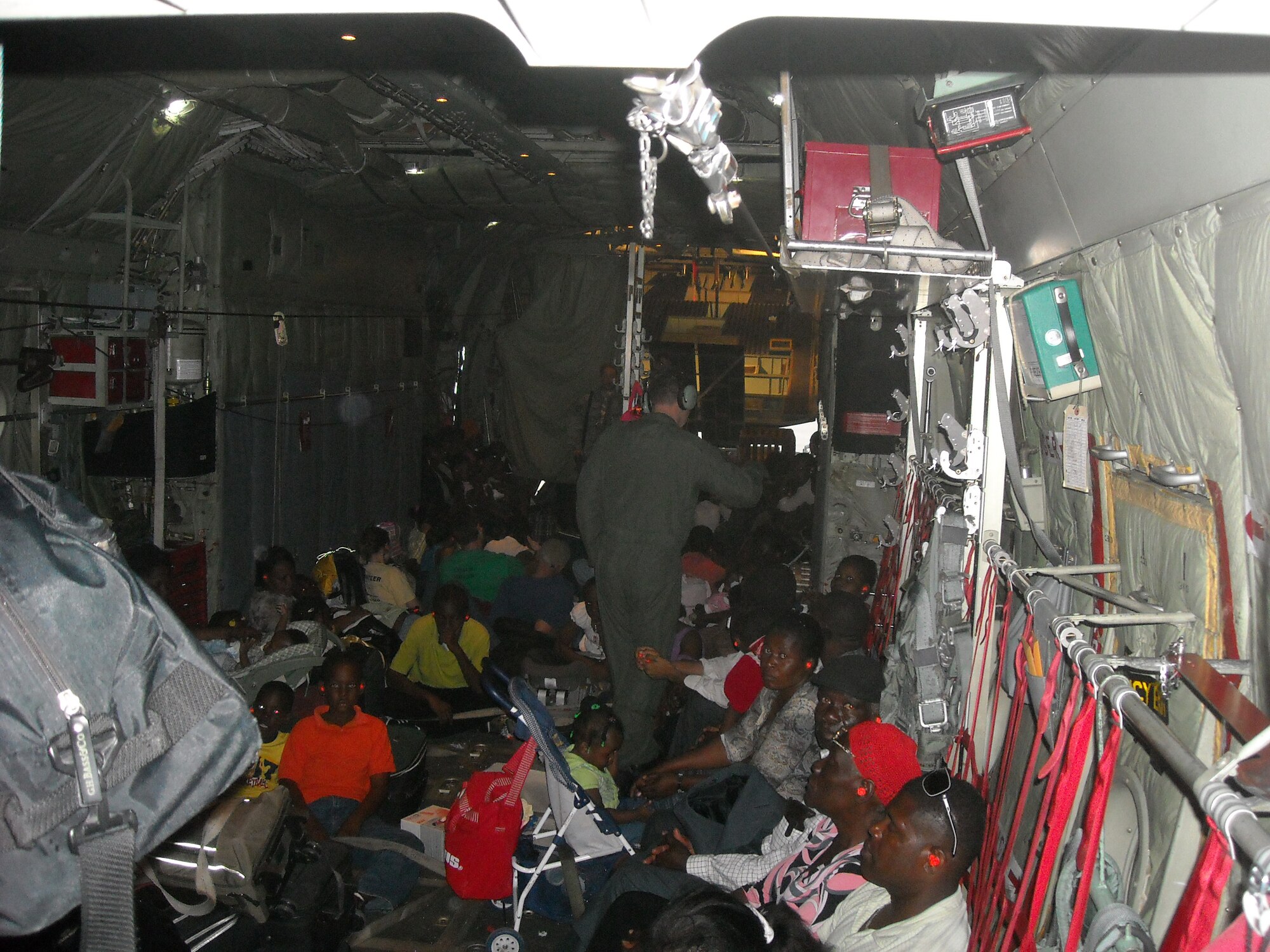 Two C-130 crews flew humanitarian aid items to Haiti and returned several American citizens to the United States, Jan. 19, 2010. One aircraft had over 60 people onboard. The people from Haiti were dropped off at Homestead Air Reserve Station in Florida before the crew returned to Berry Field, Nashville.
