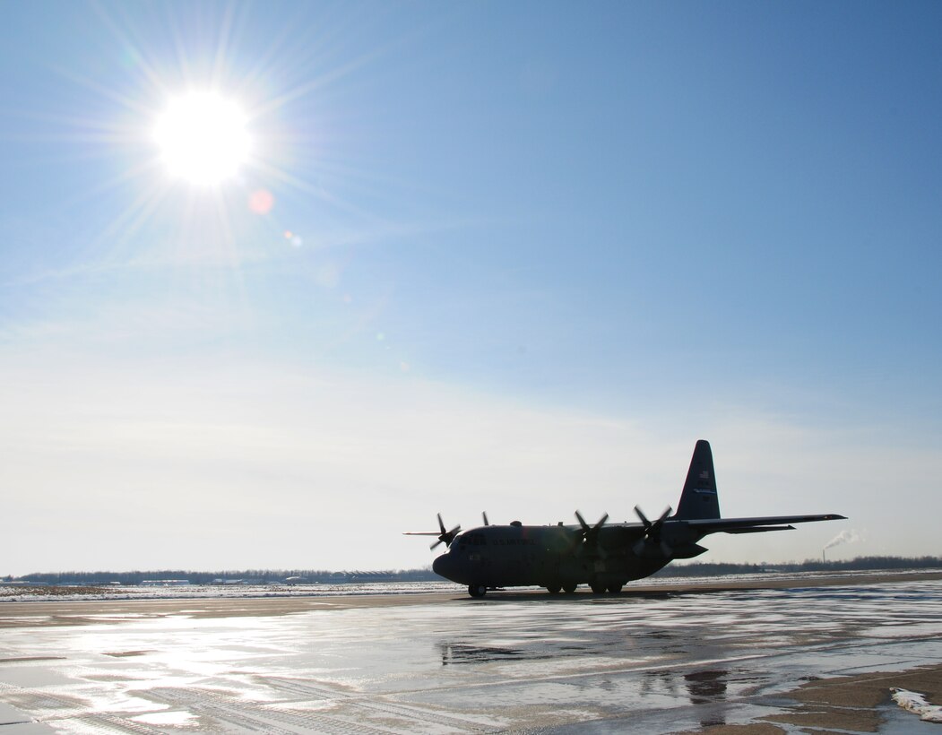 NIAGARA FALLS AIR RESERVE STATION, NIAGARA FALLS, NY-- Aircrew from the 914th and 107th Airlift Wings  return from flying Haiti relief missions, January 21. (U.S. Air Force photo by Staff Sgt Stephanie Clark)