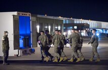 20 January 2010  USAF Photo by Jason Minto.  A U.S. Army carry team transfers the remains of Army CPT Paul Pena of San Marcos, TX, at Dover Air Force Base, Del., Jan 20, 2010.  